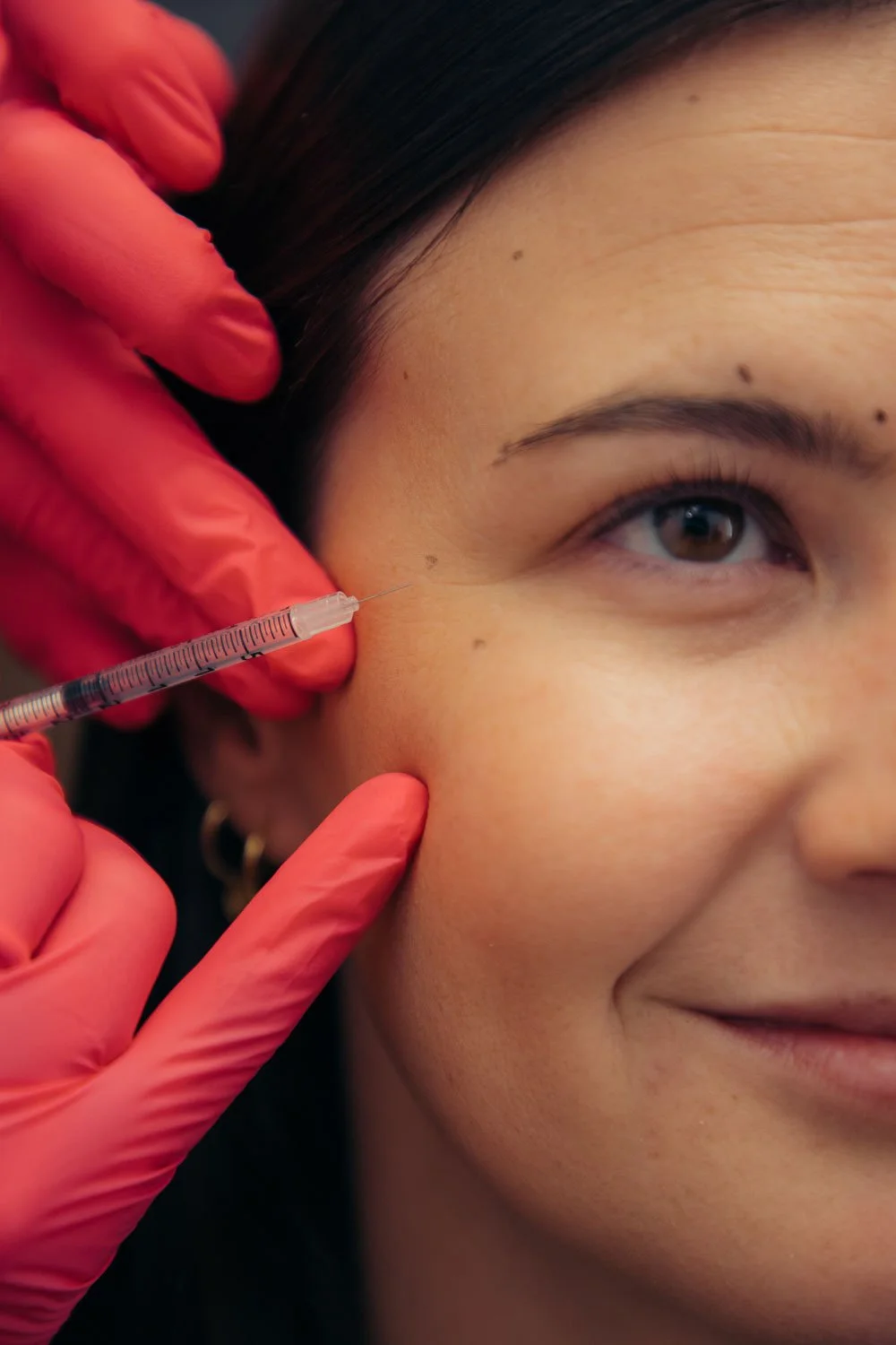 Skilled provider performing a Daxxify facial injection — learn about Daxxify cost and pricing at. our med spa near Peoria, AZ