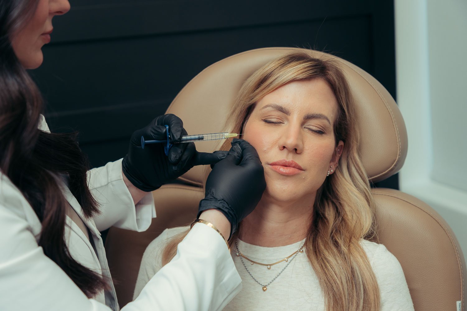 Daxxify near Peoria, AZ, patient consultation and facial treatment at a local med spa.