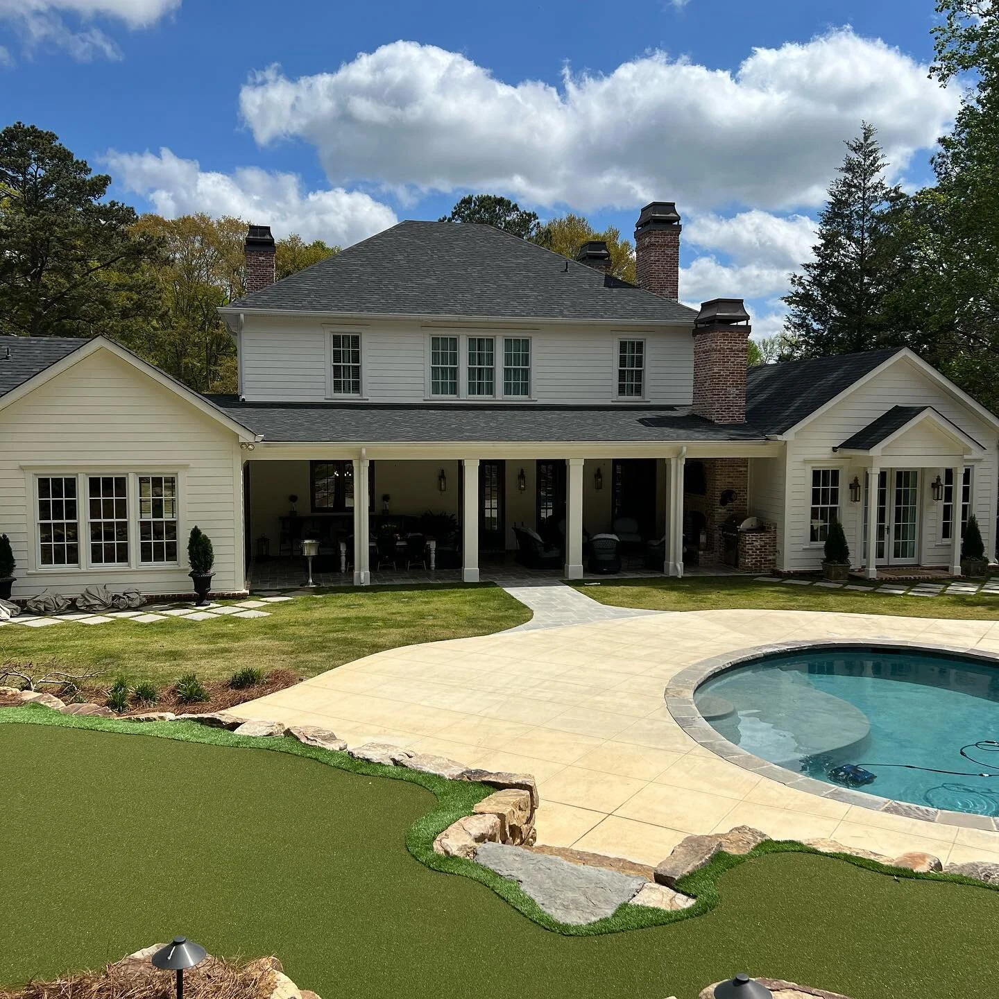 Summertime in the South is east living with an amazing backyard like this one. @tbe_pools and @erudd01 knocked it put of the park at our latest project in Auburn, AL.
