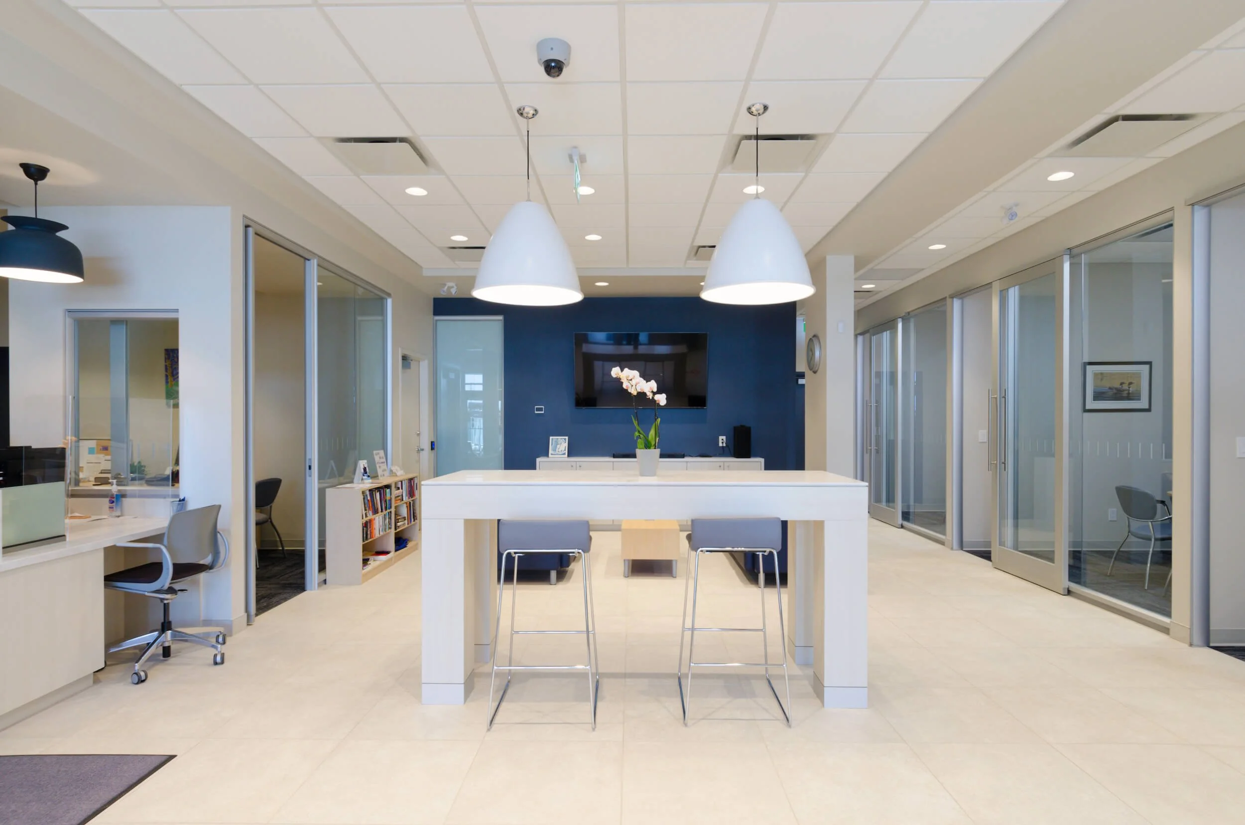 A modern blue and white office room