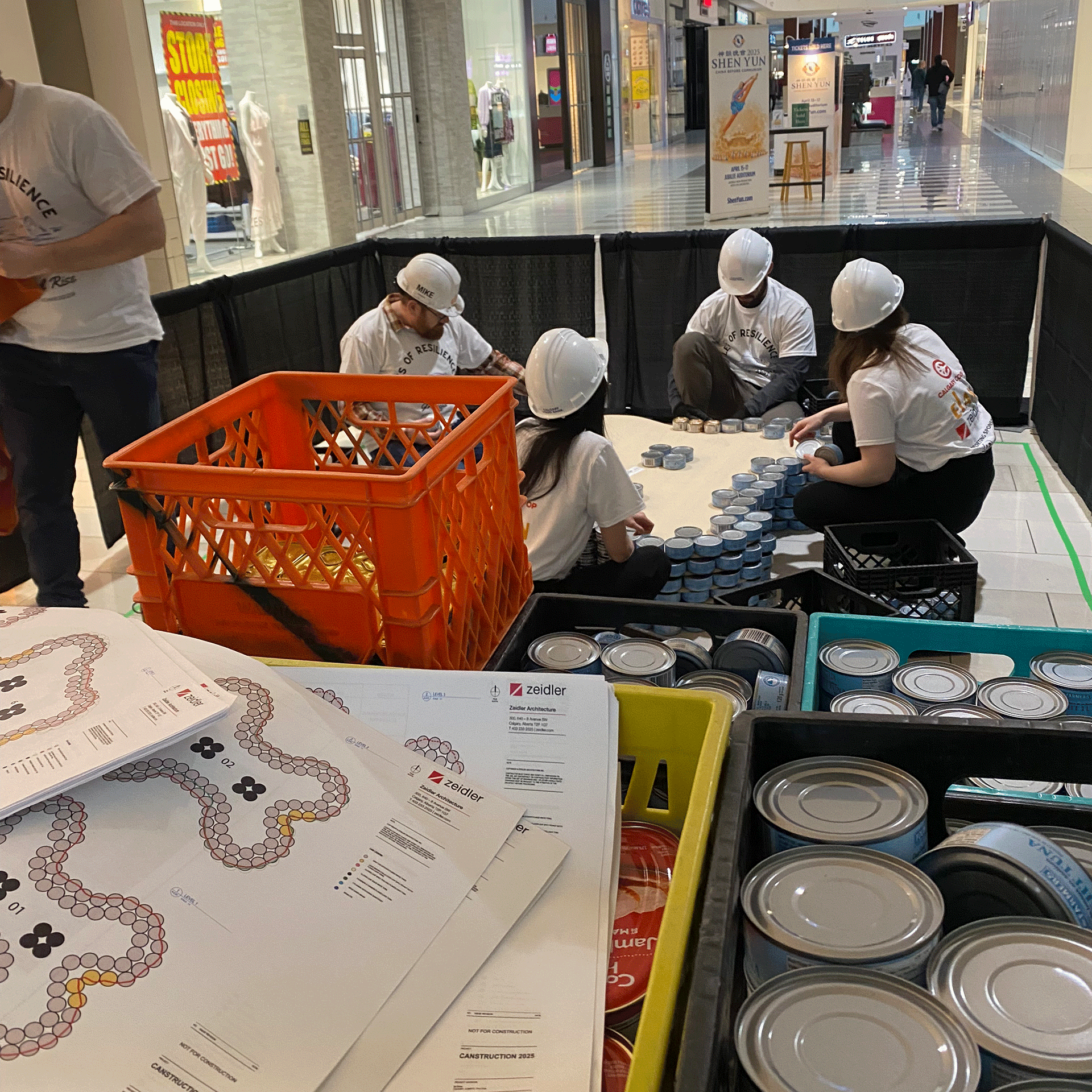 calgary-food-bank-canstruction-2025-elan-construction-team-work3.png