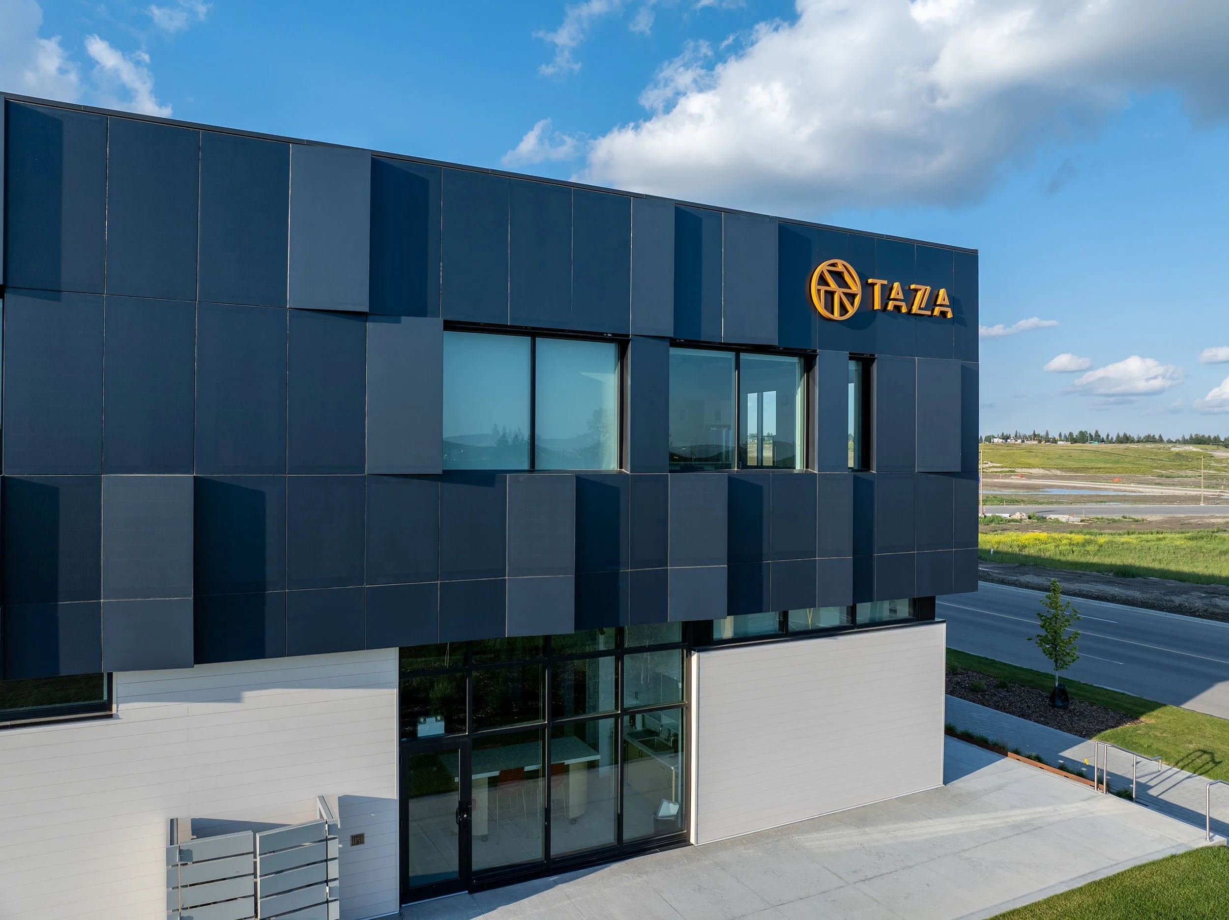 Elan Construction_Taza Marketing Centre_logo on building.jpg