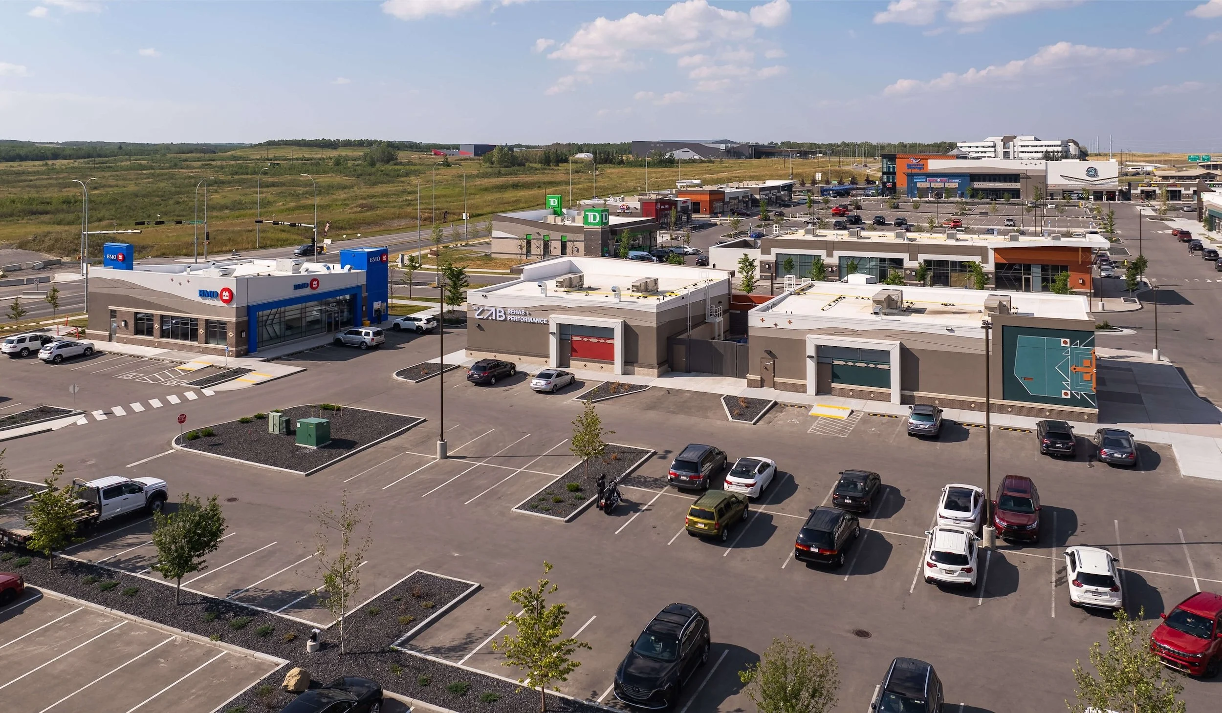 taza-shops-at-buffalo-run-parking-lot-and-businesses-elan-construction.jpg