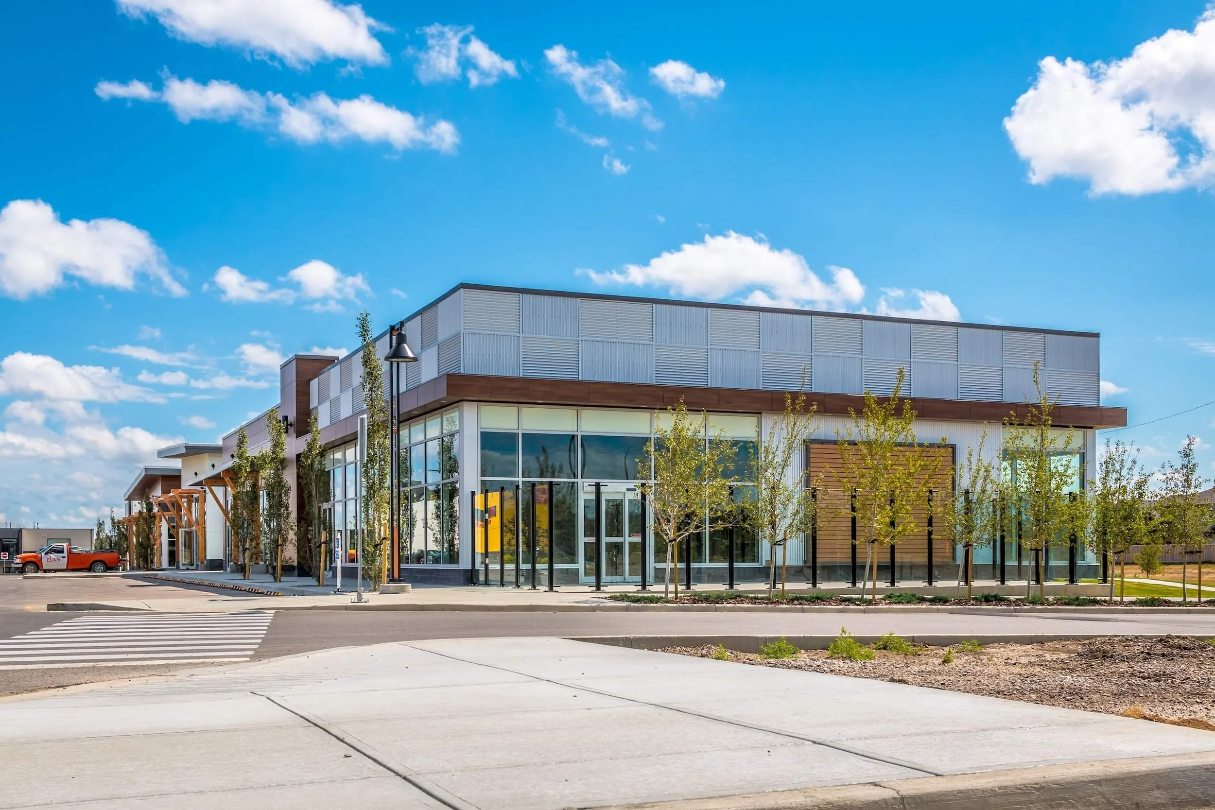A sunny day with a modern looking building