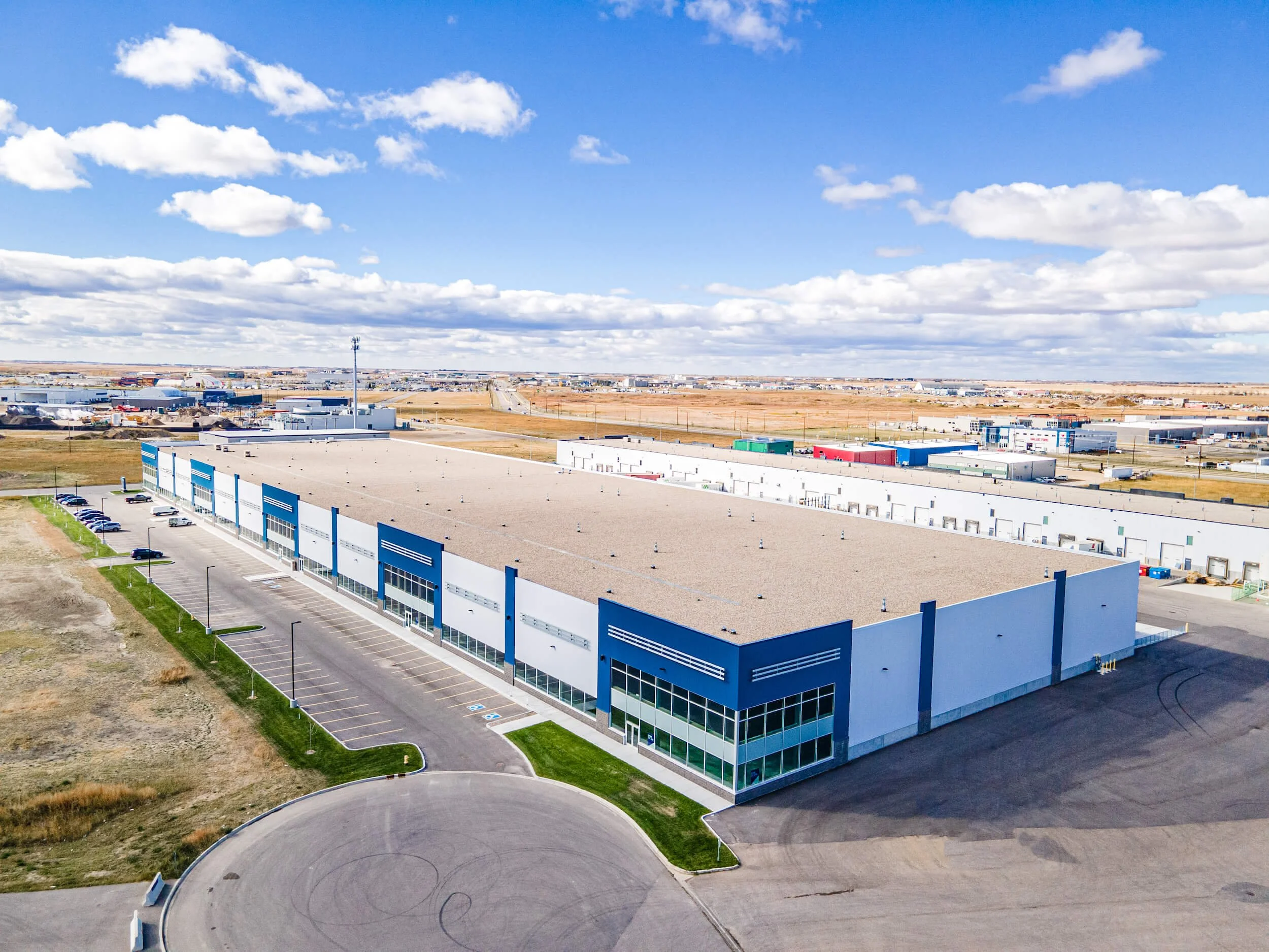 A landscape view of a blue and white building