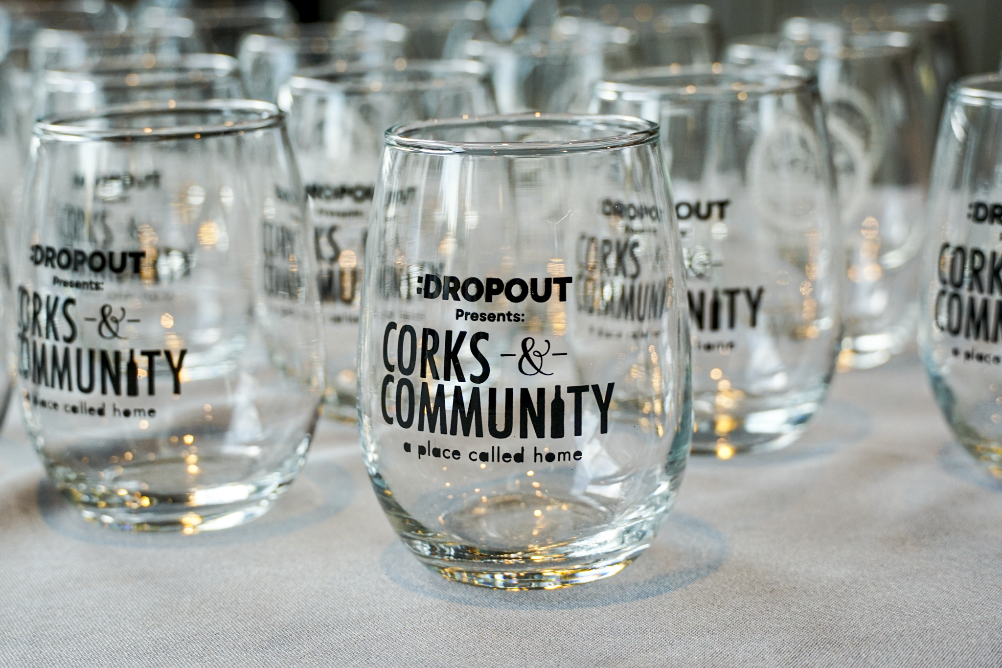 Glassware designed for DropOut TV x A Place Called Home's food and wine event 2025
