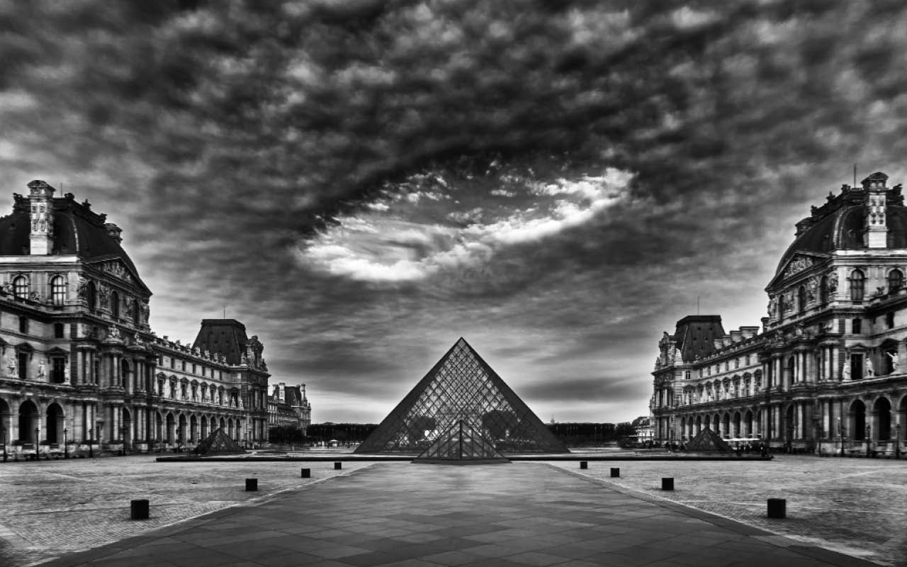 Ian Borthwick, Cosmic Energy , 2020
The Cour Napoléon of the Louvre, perhaps the world’s greatest art museum, and its now-iconic glass and steel pyramid by I.M. Pei. Hovering above this majestic vista, the surreal cloud formation a stark reminder t
