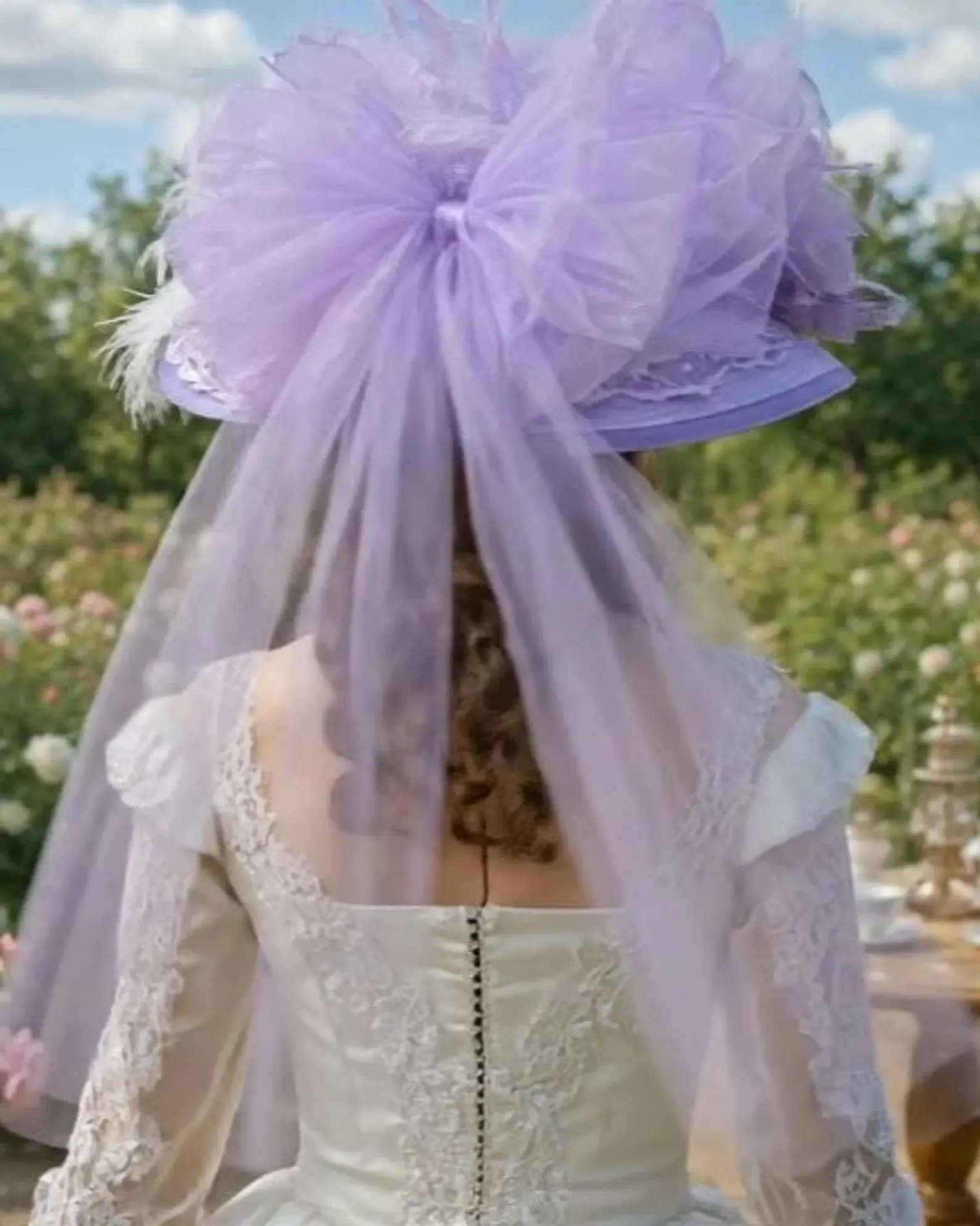 Lovely Big Lavender Bow on the back of a Victorian Style Tea Party Hat.