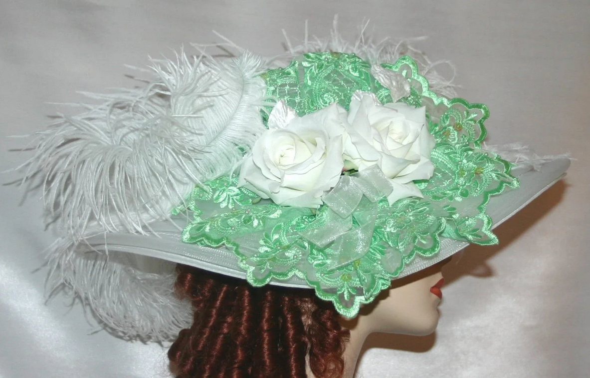 Sideview of Edwardian Style Hat - Green Lace and White Roses.