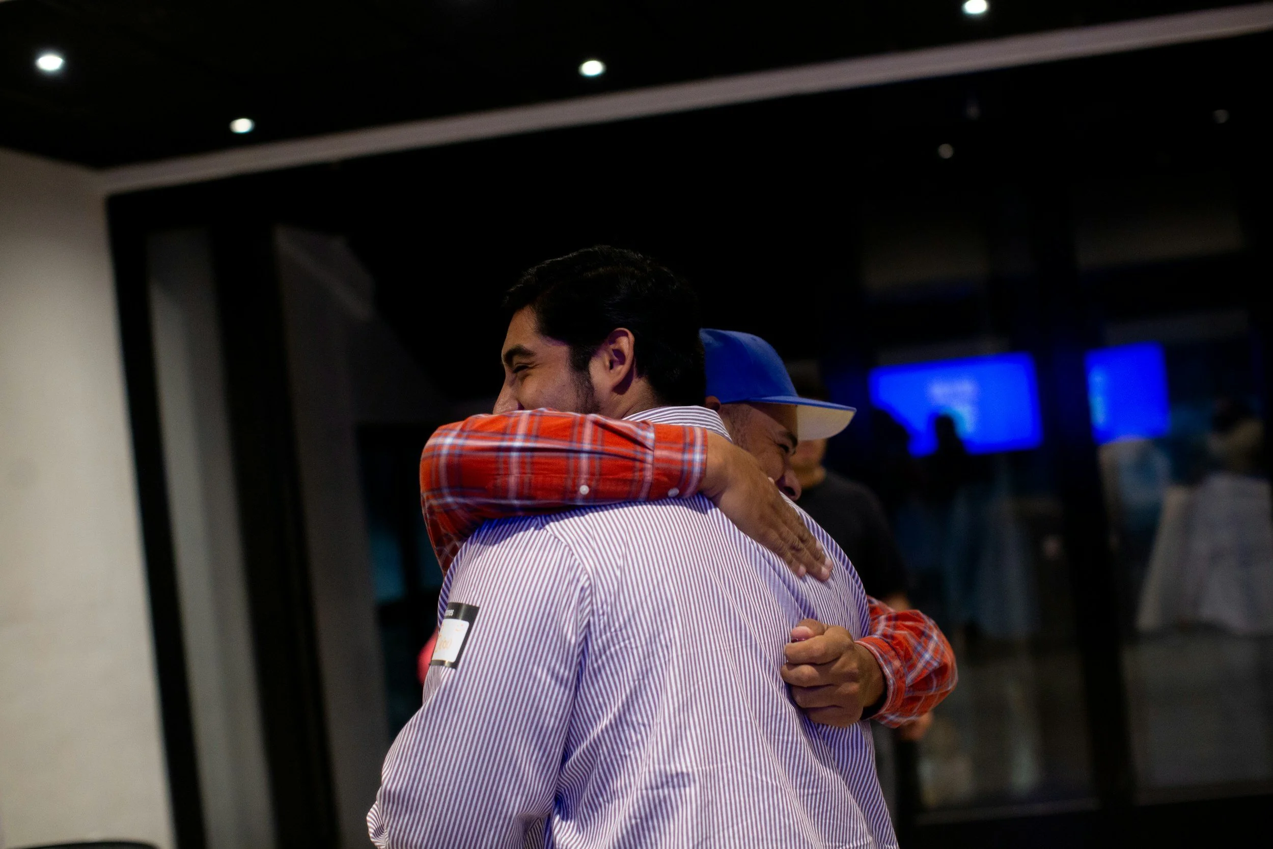 Two guys hugging