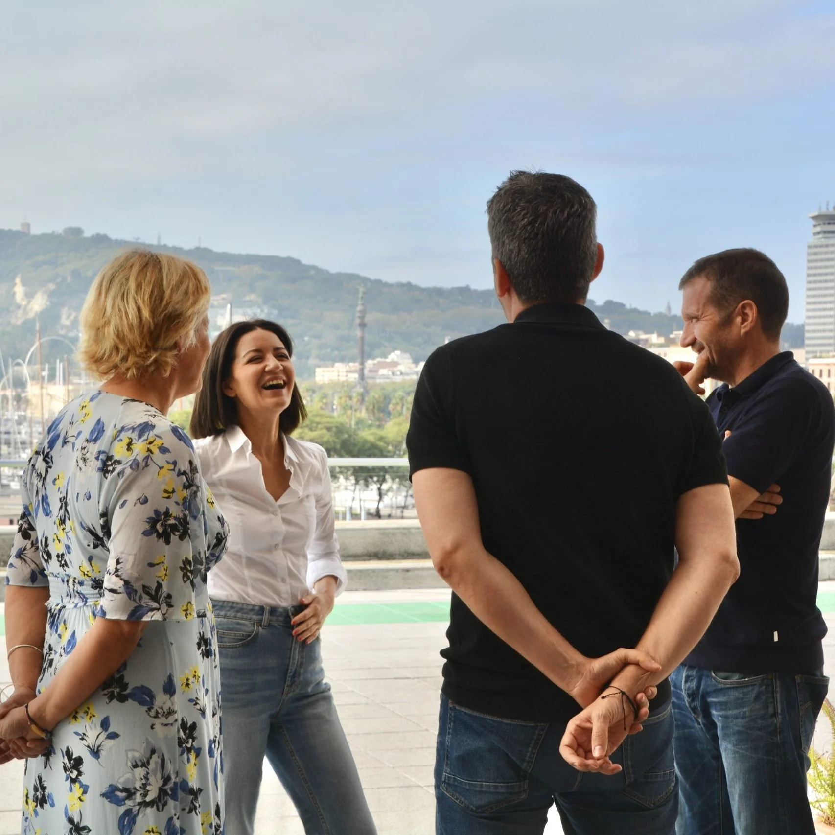 A group of individuals talking in a circle
