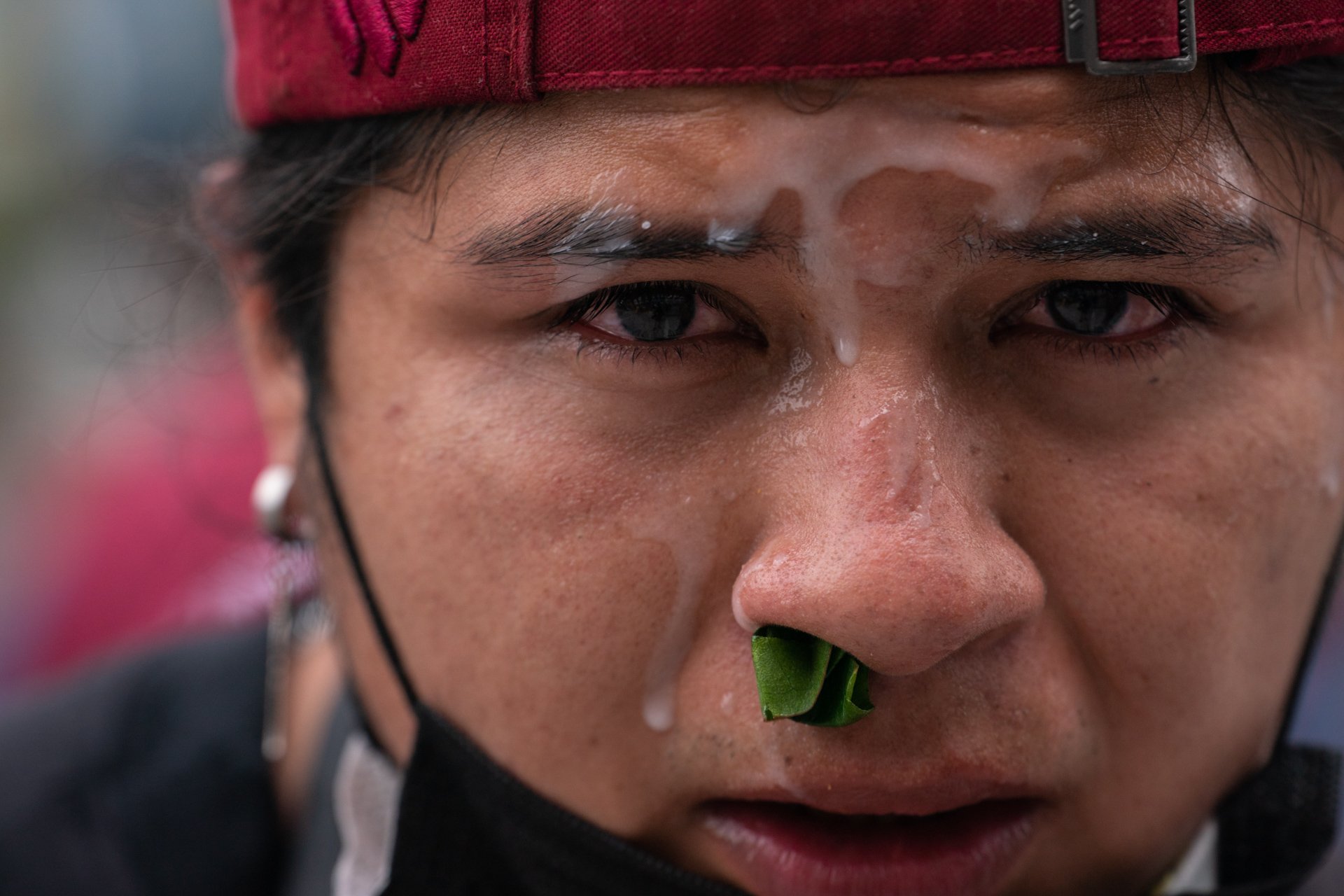 A protester is seen with a treatment for tear gas following a confrontation with security personnel after Ecuador's armed forces warned they would not allow ongoing protests against President Guillermo Lasso's economic policies to damage the country'