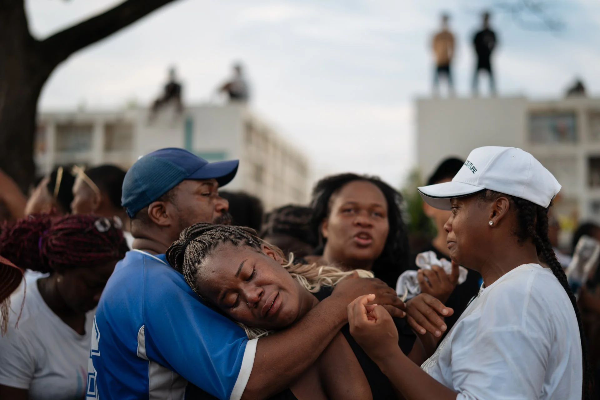 A relative breaks down during the burial of one of four boys killed after being detained by military personnel in Guayaquil. Their burned bodies were found two weeks later in an area near an air force base. Sixteen soldiers are under investigation, w