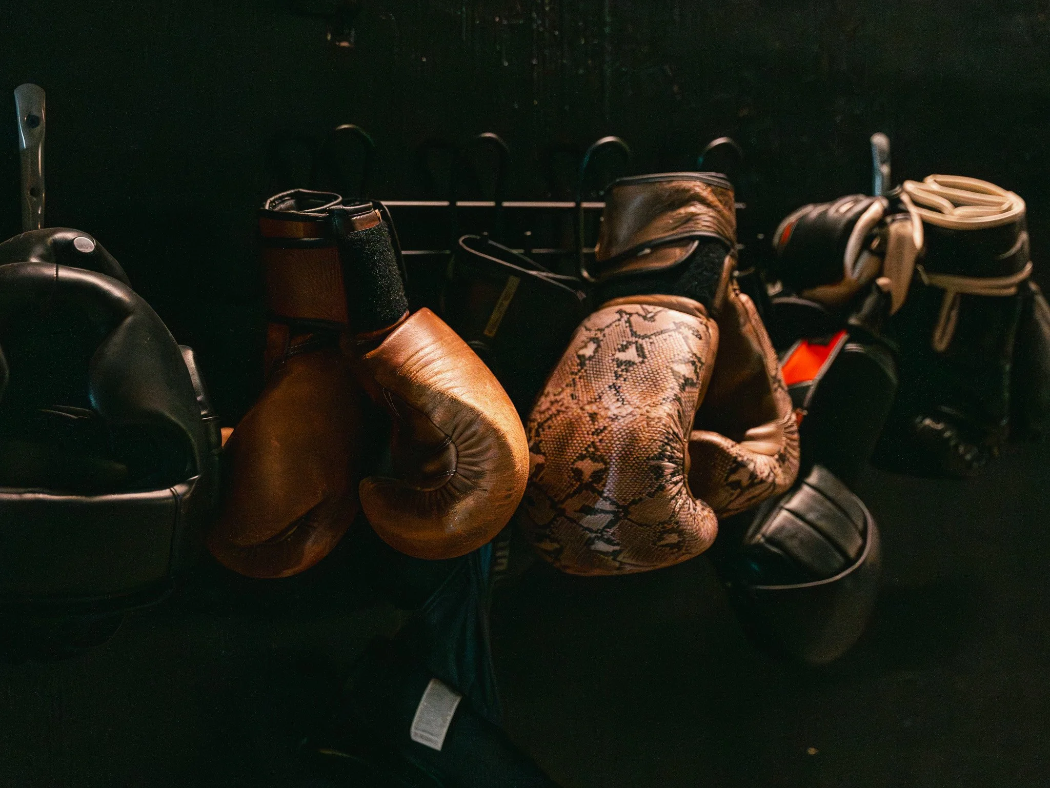Boxing gloves and training gear at The Forge Gym