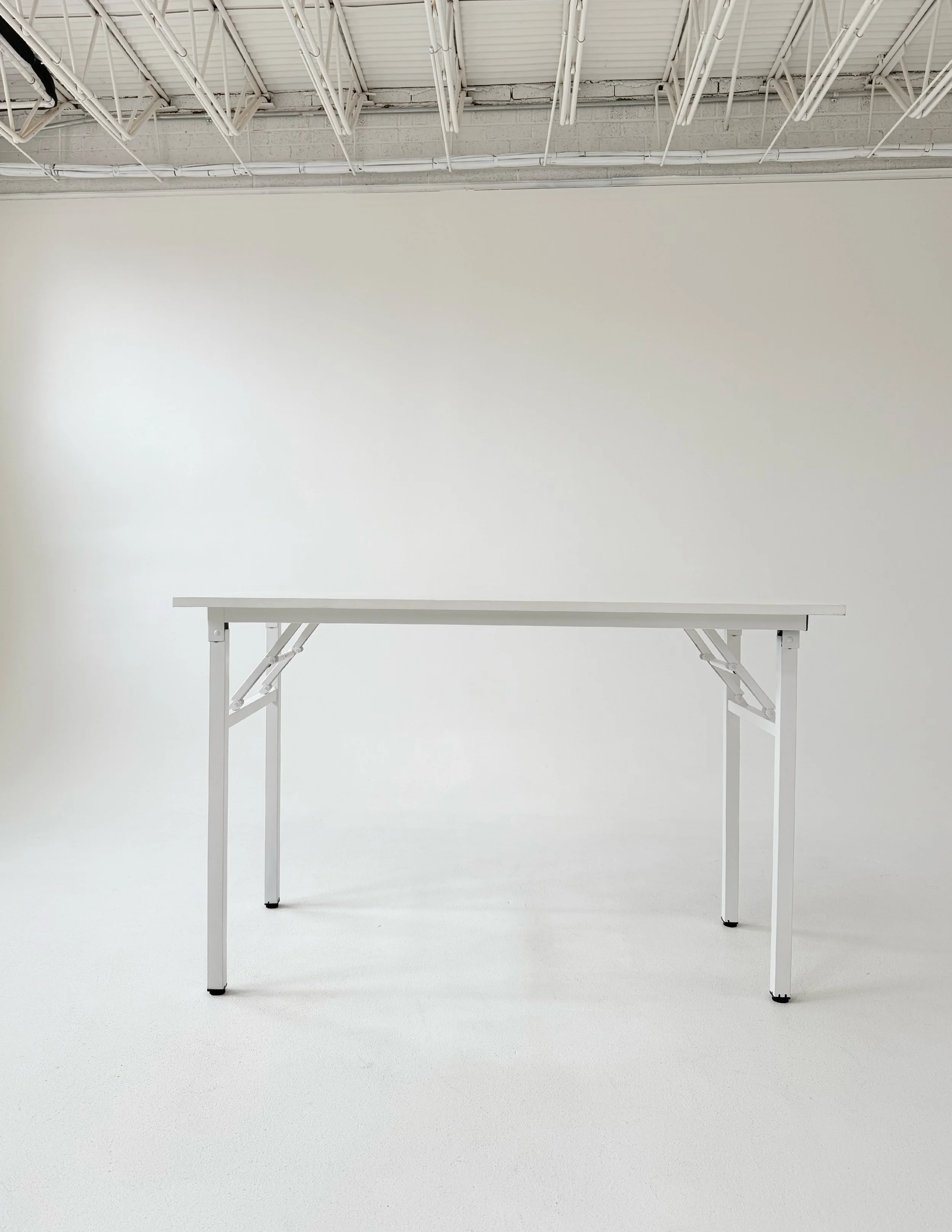 White folding desk at Sixteenth St. Studio in Greeley, Colorado