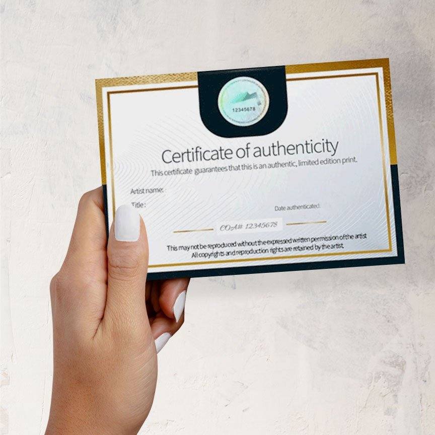 Portrait Collection Series certificate of authenticity card held in a hand