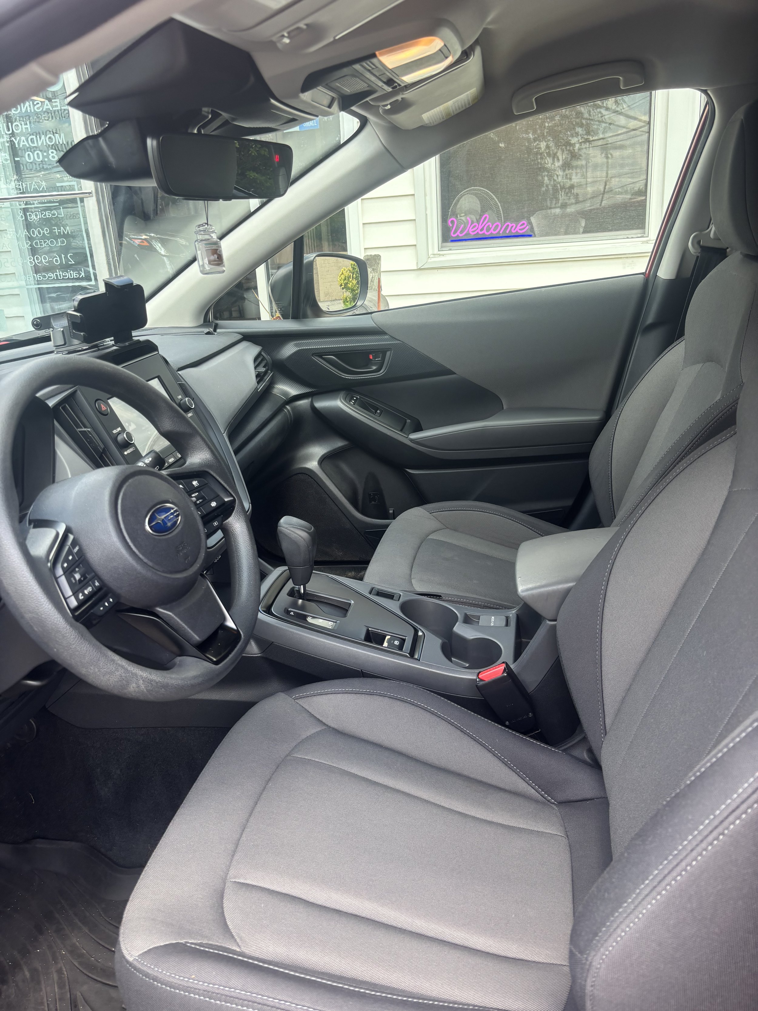 red crosstrek front seat.jpeg