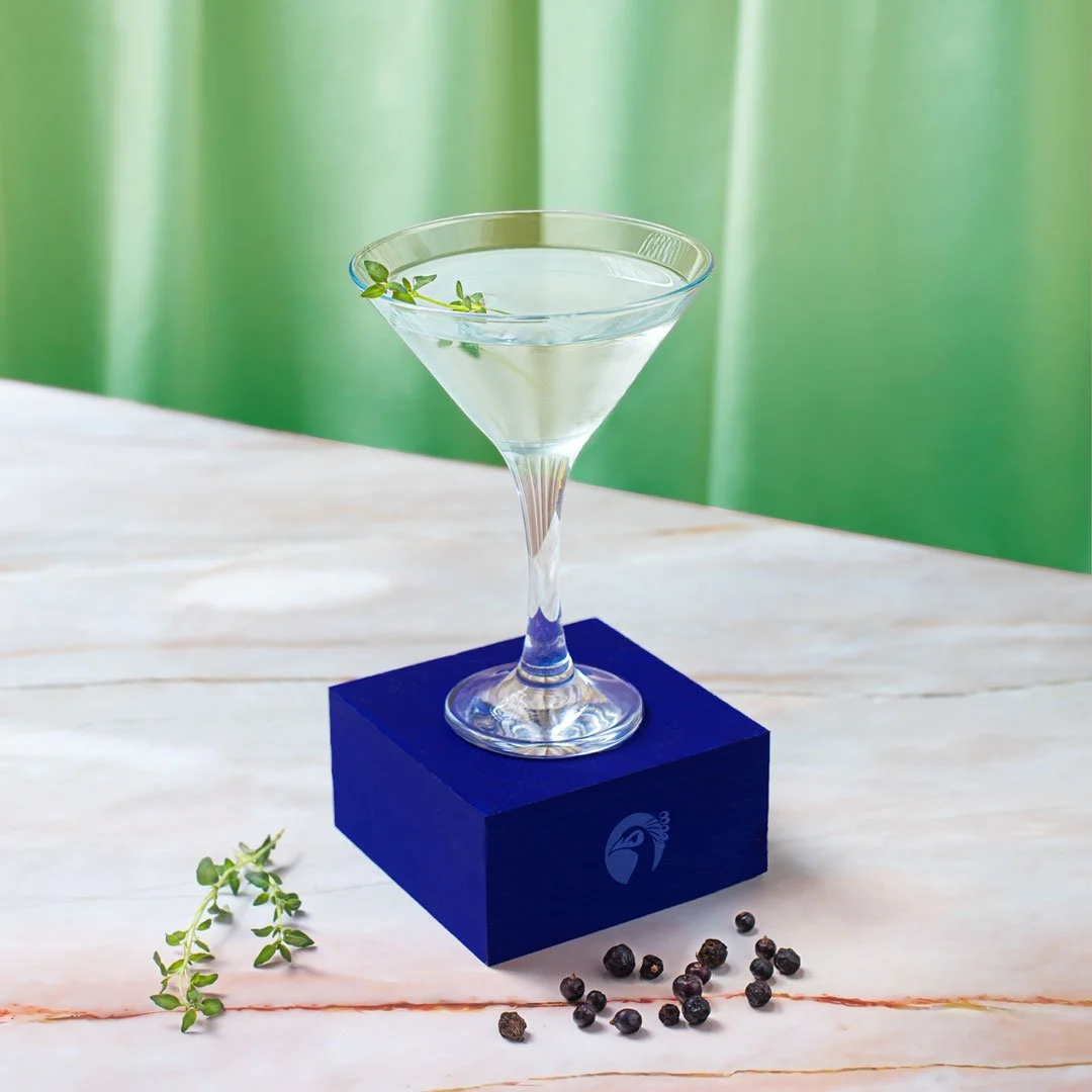 Pickering's Gin martini on blue plinth 