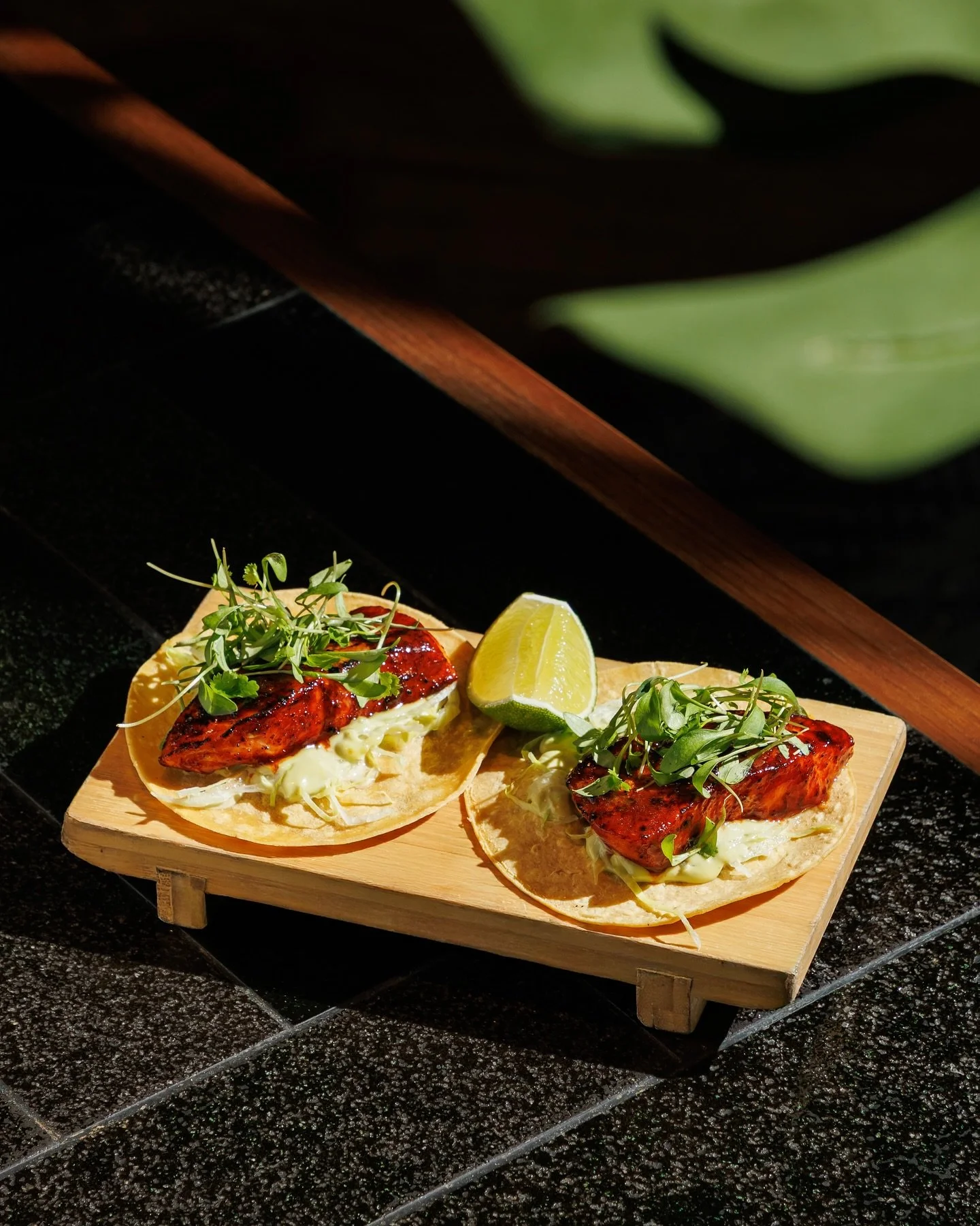 The Día de los Muertos specials.
Guac with yakiniku, soft-shell crab maki, spicy tuna on crispy rice, pork belly + blackened salmon tacos, and a salted brownie topped with white-chocolate skull bonbons.
Blood Moon and Mezcal Espresso Martini