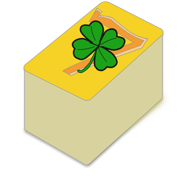 A rectangular block of butter with a four-leaf clover on top, and a small slice cut out showing the inside.