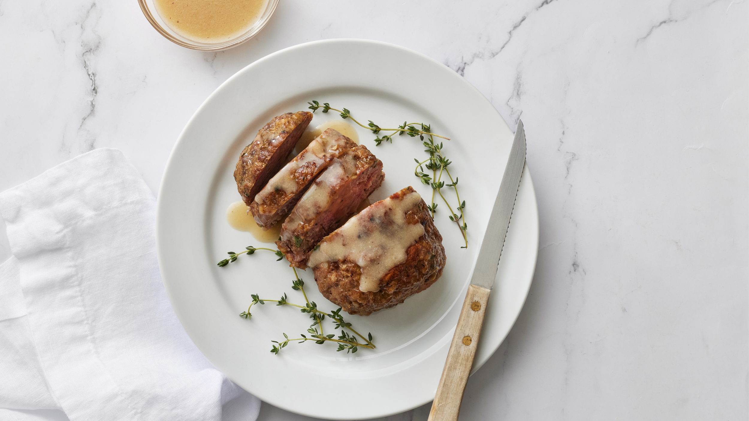 Meet the new Summerhill House Meatloaf with Garlic Sauce.