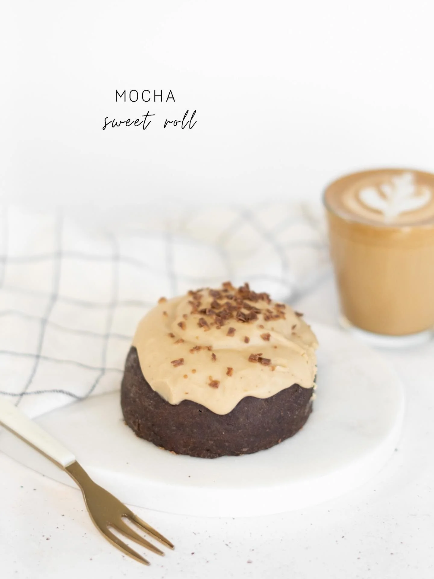 Soft, swirled chocolate dough wrapped around a sweet espresso filling and topped with fluffy espresso cream cheese frosting &mdash; the perfect companion to your morning coffee. ☕