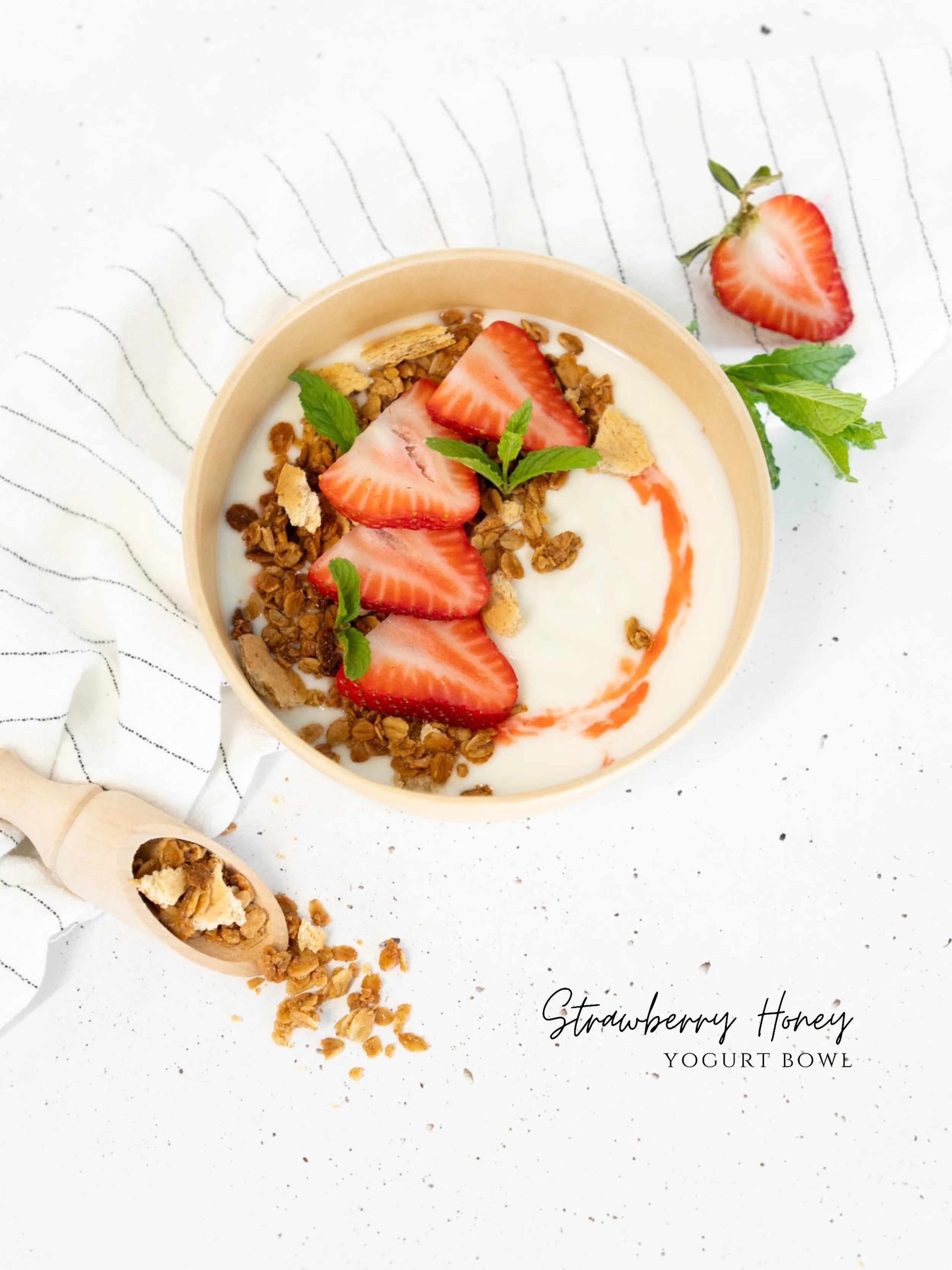 Creamy vanilla yogurt layered with swirls of sweet strawberry jam and crunchy graham granola, then topped with juicy fresh strawberries and a drizzle of golden honey. It&rsquo;s creamy, crunchy, fruity, and just the right kind of bright&mdash;like a 