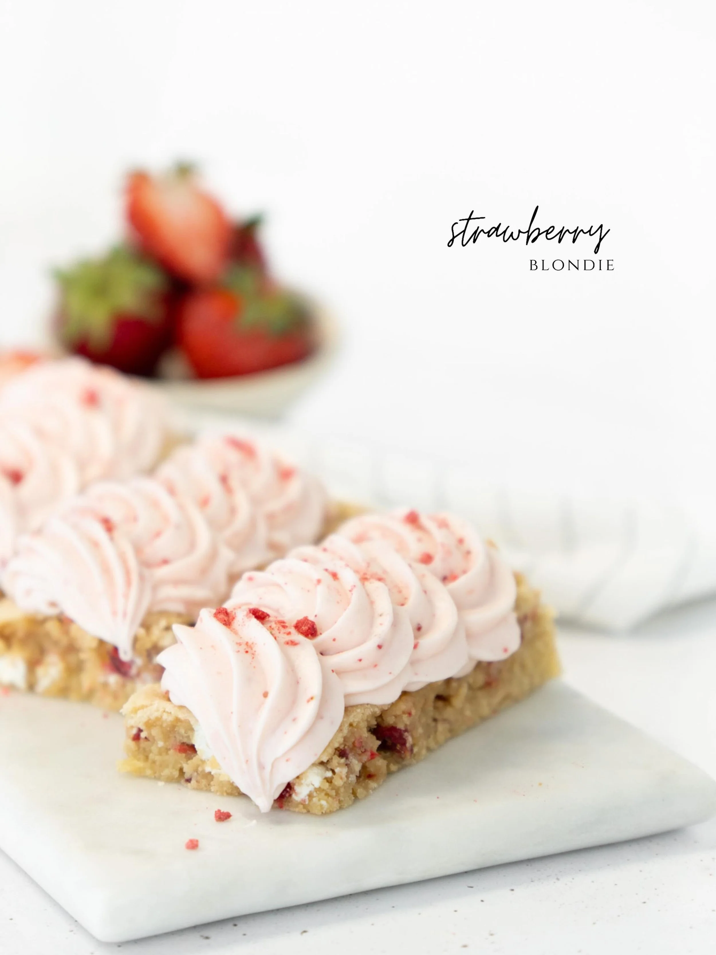 A soft, buttery strawberry blondie that feels like spring baked into a square. 🍓Each bar is rich and chewy with golden blondie goodness, folded with sweet strawberries and creamy white chocolate that melts into little pockets of bliss. On top, it&rs