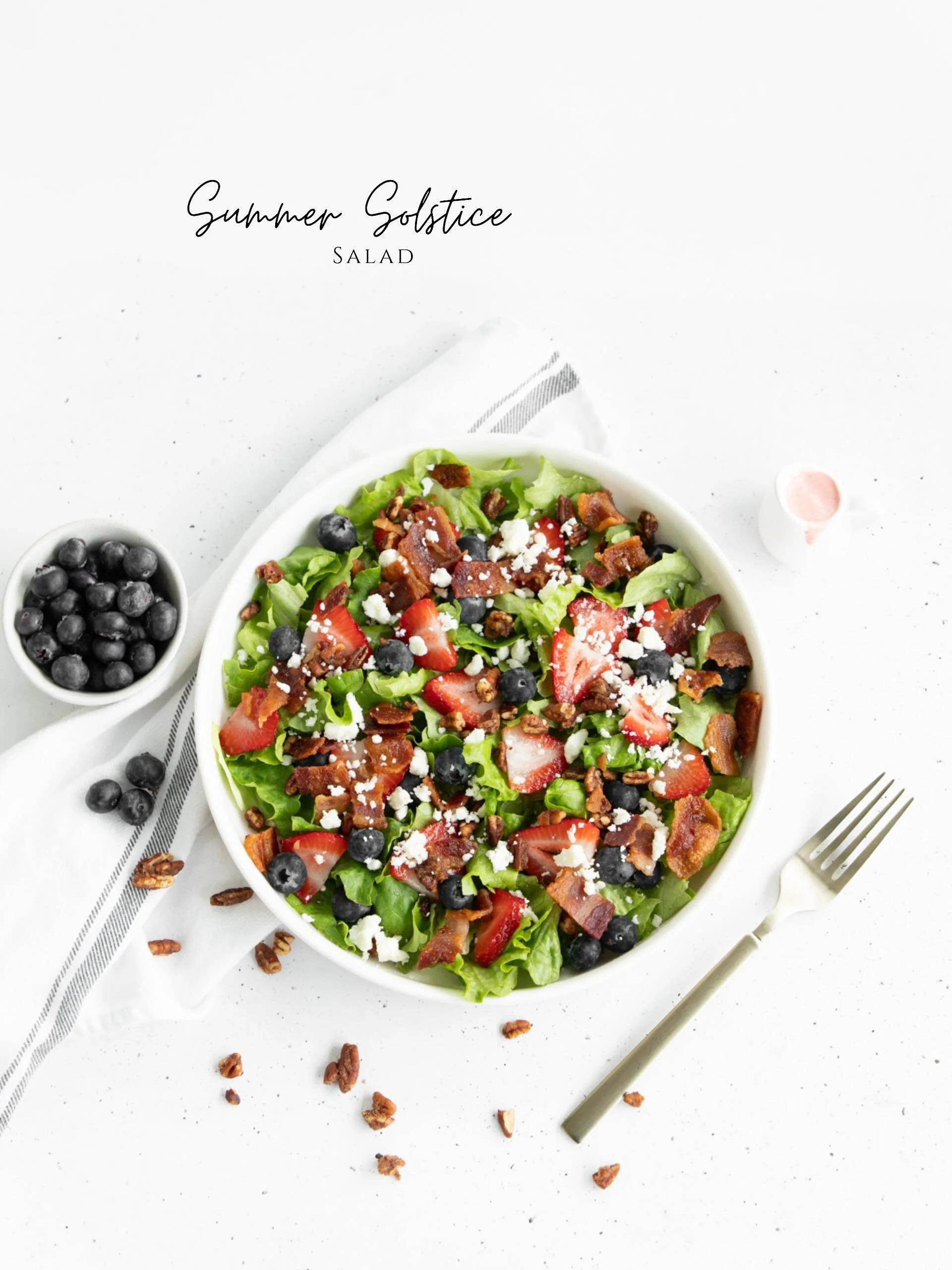 Our Summer Solstice Salad is as beautiful as it is delicious&mdash;crisp greens topped with juicy strawberries, sweet blueberries, crunchy candied pecans, and creamy feta, then served with a bright raspberry vinaigrette. Light, colorful, and bursting