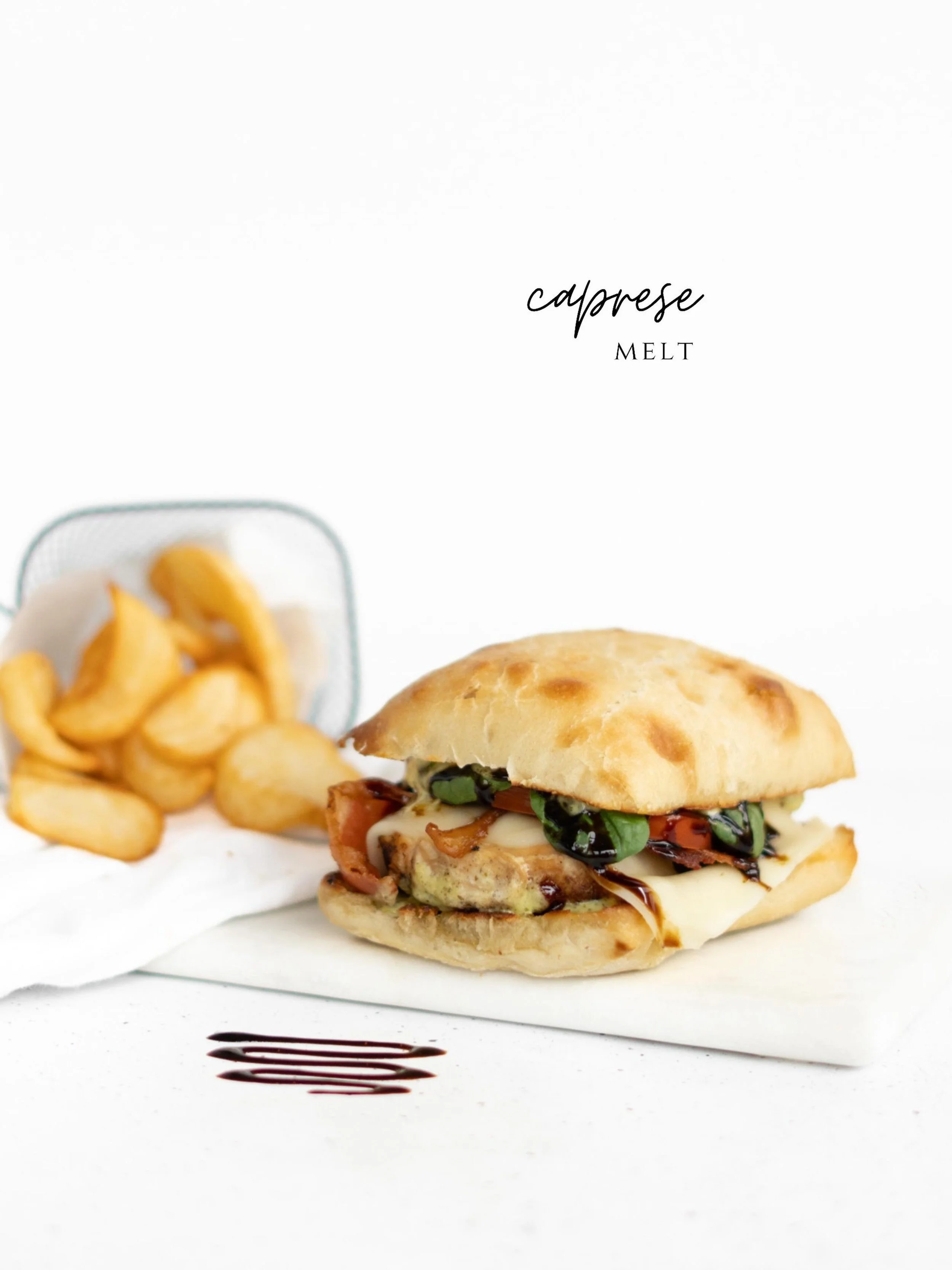 Tender grilled chicken, crispy bacon, fresh mozzarella, ripe tomatoes, and spinach layered on toasted ciabatta and spread with creamy pesto. Finished with a drizzle of sweet balsamic glaze, this warm, melty sandwich is packed with savory flavor, fres