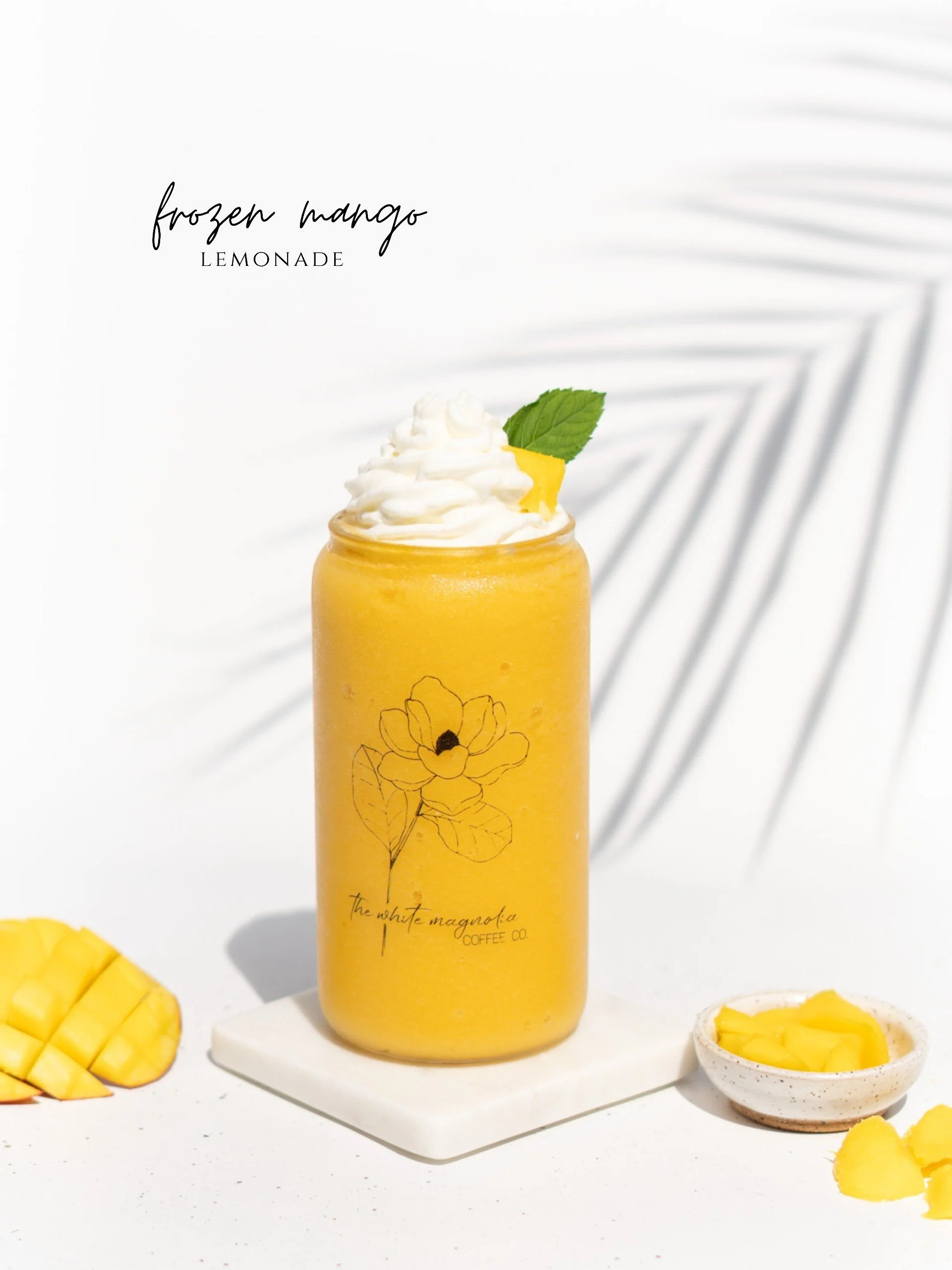 Sweet mango and zesty lemon are blended with ice for a smooth, frozen lemonade with a hint of mint. Topped with whipped cream and a fresh mango slice, it&rsquo;s an easy way to cool off on a hot summer day.