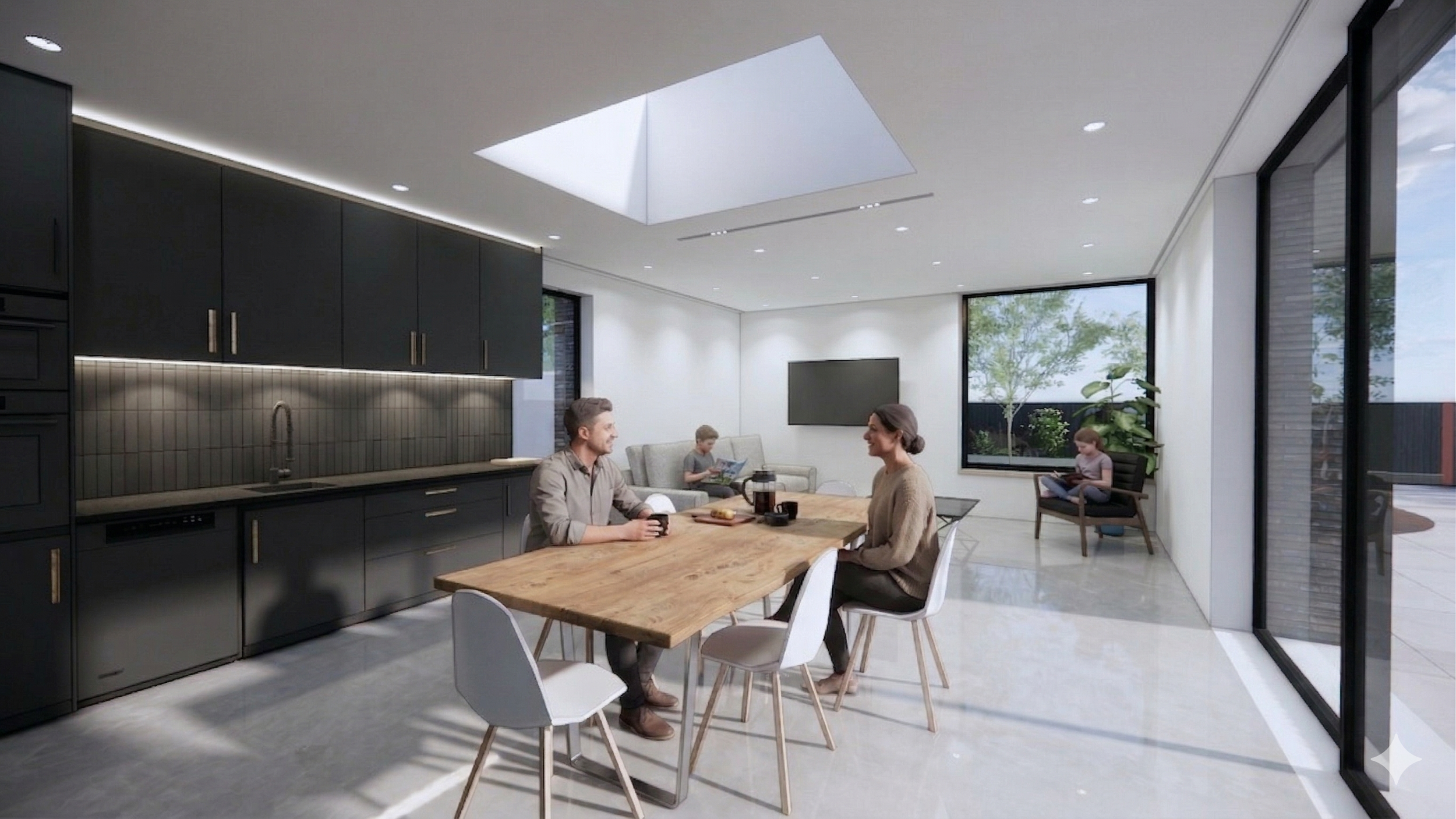 Interior view of living area, with people siting at dining table, dark coloured kitchen on left. and sofas behind table