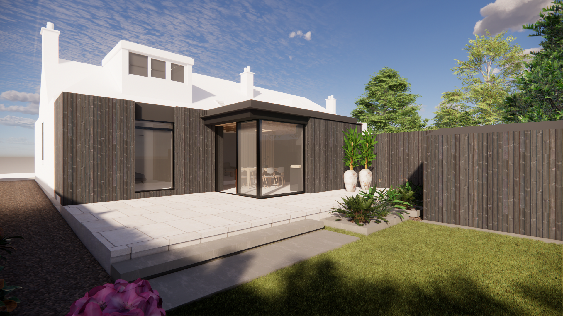 Dark timber clad extension with full height glazing