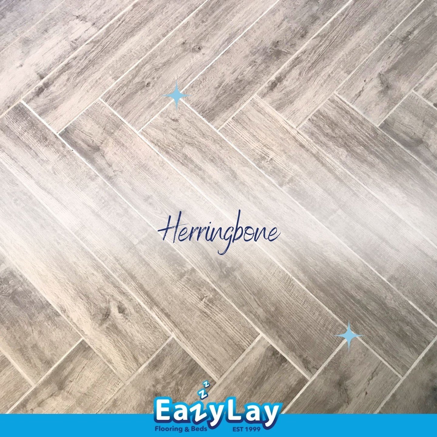 Embrace the timeless elegance of herringbone flooring with a modern twist! Our LVT option offers all the sophistication of wood, without the upkeep. Discover the perfect blend of style and convenience. #HerringboneFlooring #ModernTwist #LVT