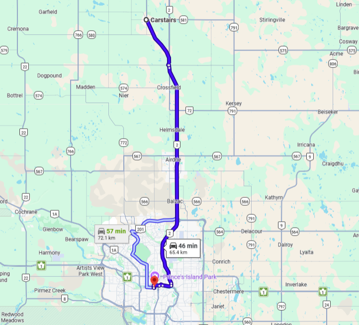 Map showing a route from Carstairs to Prince's Island Park in Calgary, Alberta, with estimated travel times of 46 and 57 minutes.