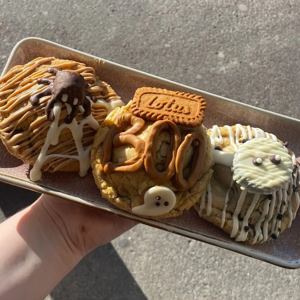 Fresh from the oven and frightfully delicious! 👻

Our Halloween cookies are baked in-store daily &mdash; soft, sweet, and perfectly spooky🍪✨

Available now &mdash; grab yours before they vanish! 💨🎃