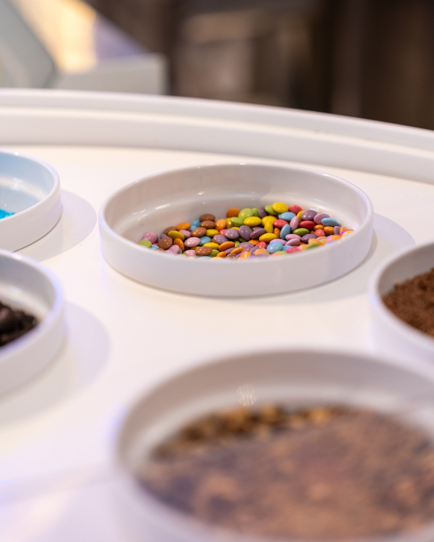 Why have a plain cone when you can have a masterpiece? 🍦 ⁠
Come get a scoop (or two) and go wild at our topping station 🌀⁠
⁠
If you can still see the ice cream, you haven't added enough sprinkles 💖