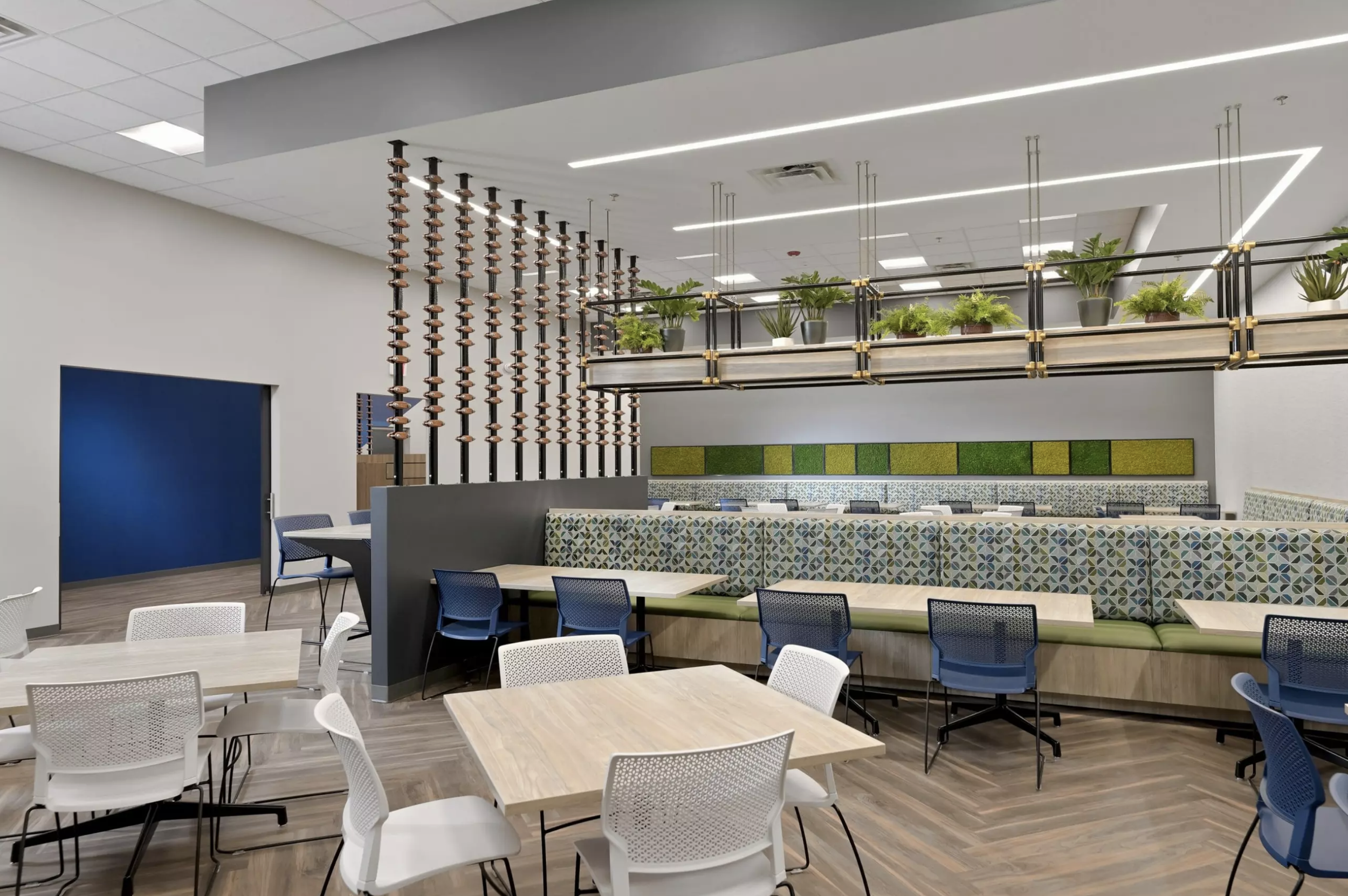Vibrant Blue and Green office break room space with bench seating
