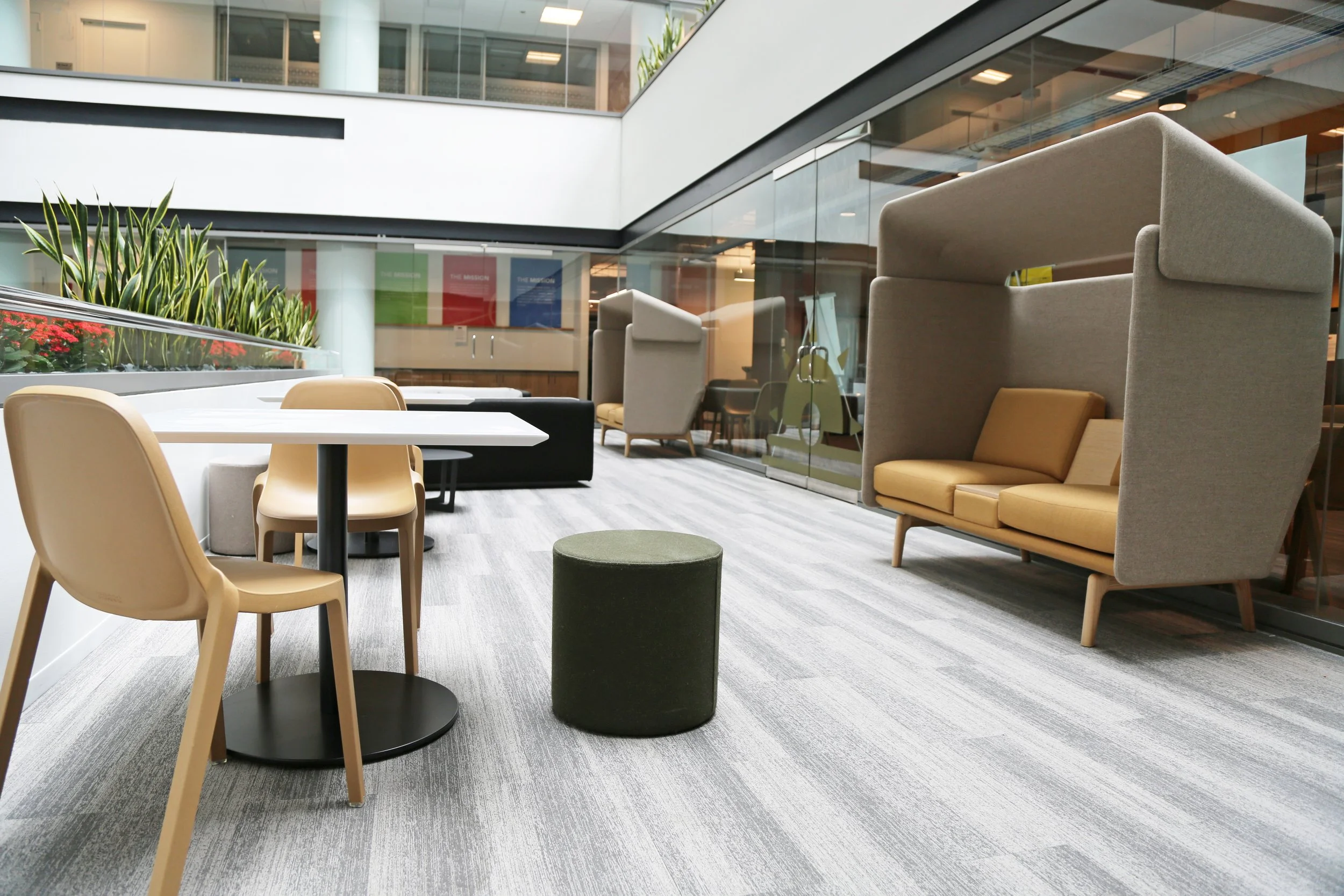 Bright office common space with custom furniture