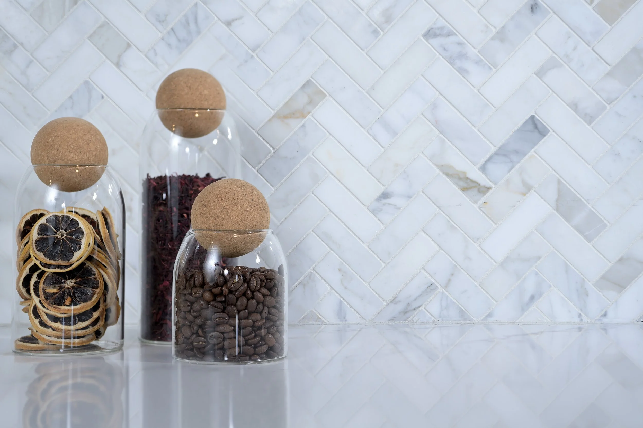 Close up of marbled backsplash tile in breakroom kitchen