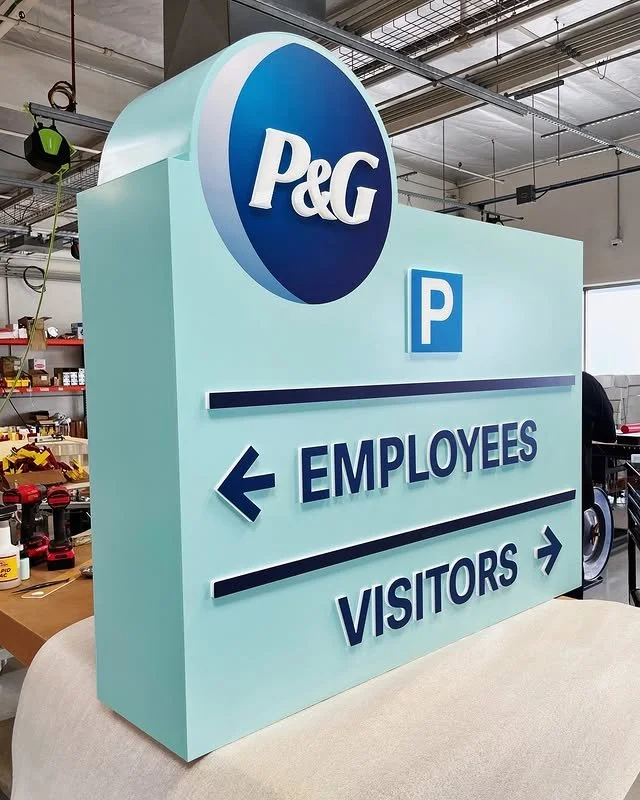 P&G - Illuminated Push-Thru Directional Cabinet