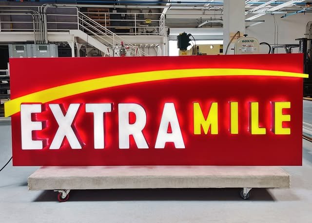 Extra Mile - Halo & Face-Lit Channel Letters on Backer