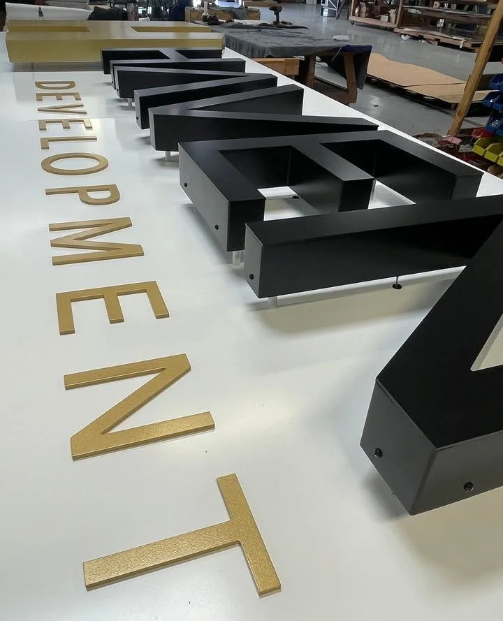 Haven Development - Halo-Lit and Dimensional Lettering on Cabinet Backer