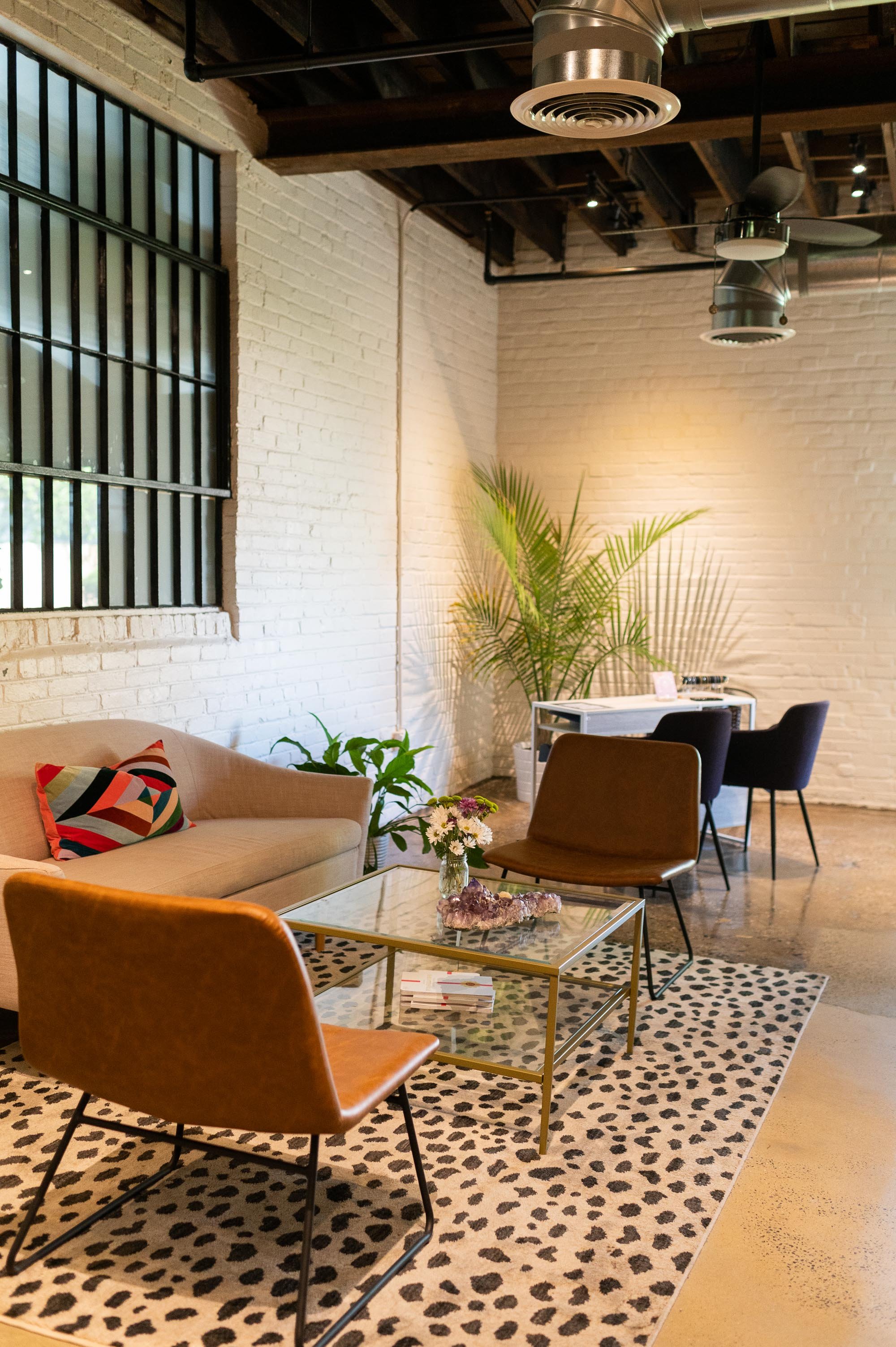 Vibrant, stylish modern lobby at The Brow House in Charlottesville, welcoming clients