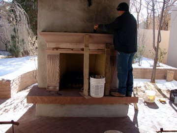 Working on a Colorado red sandstone fireplace.
