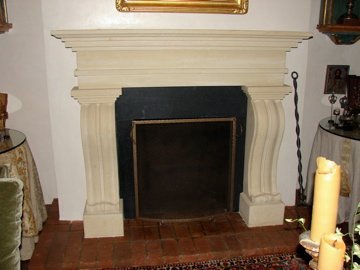 Antiqued Texas limestone fireplace for a private residence in Santa Fe.