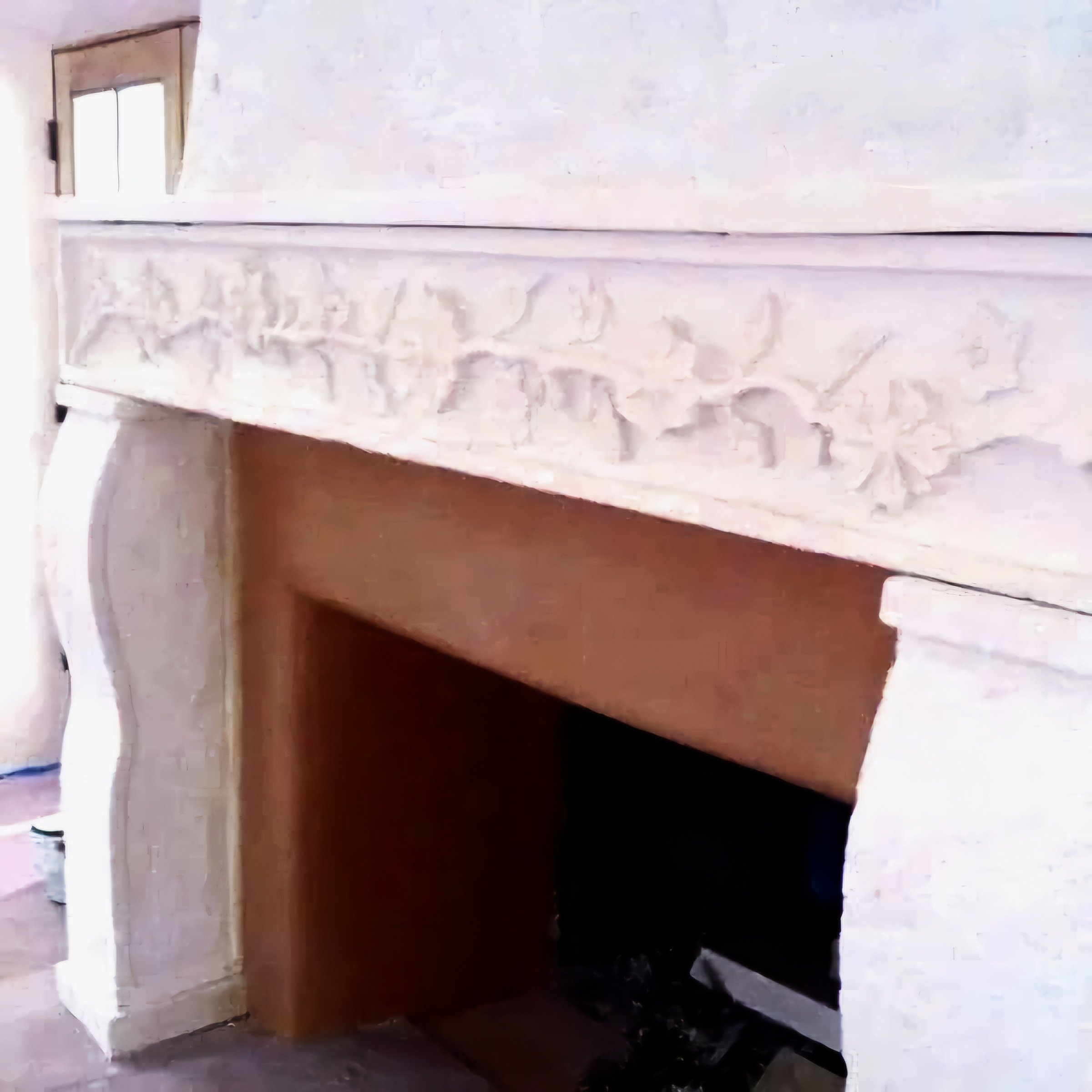 Antiqued Texas limestone fireplace