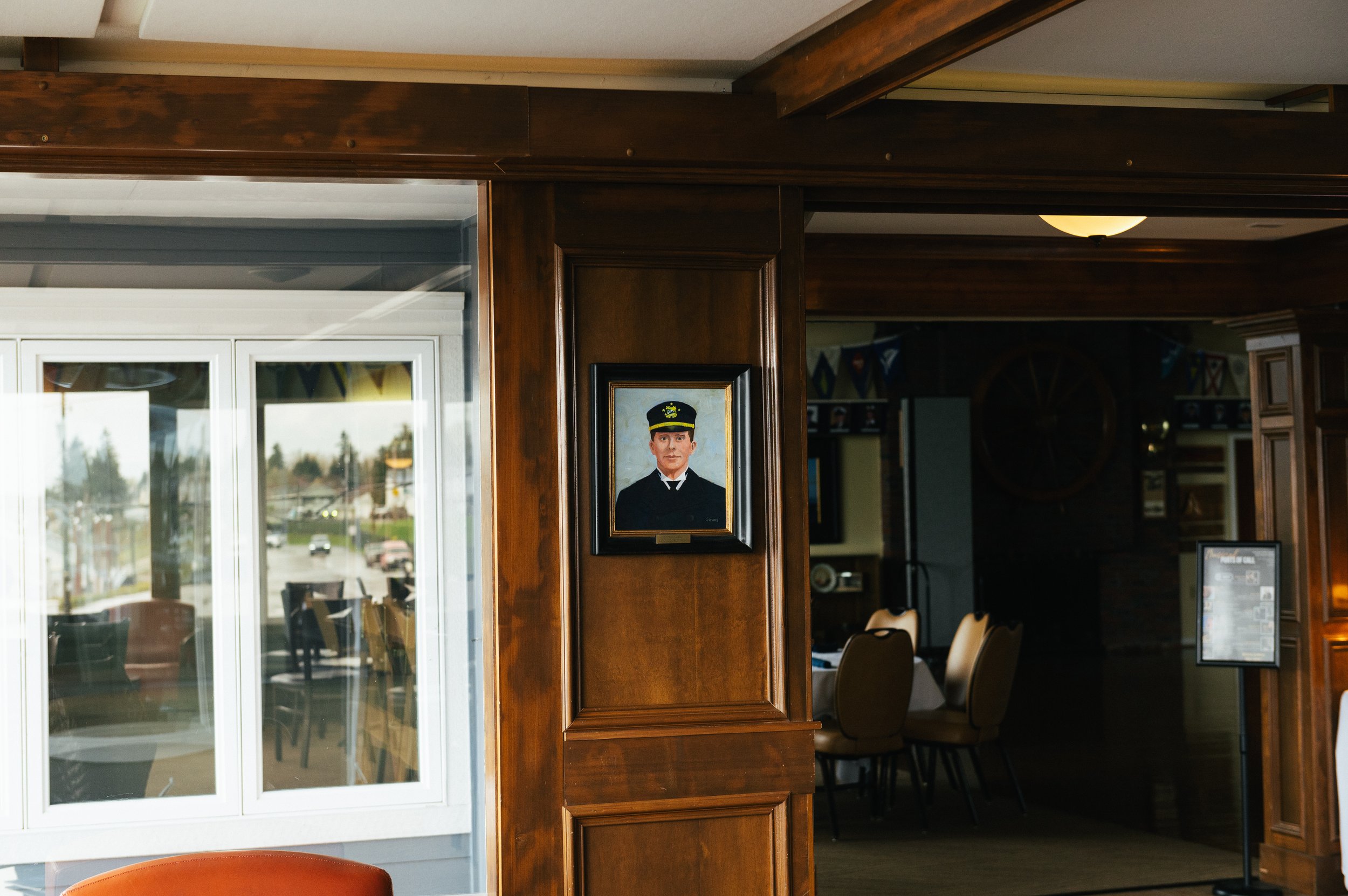 A sailor-themed picture on the wall in the office of GEOFF HELZER - THE SECOND WIND, PORTLAND, OR