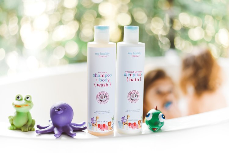 Two bottles of baby shampoo and a toy, captured in a visually appealing manner for showcasing the best product photography.jpg