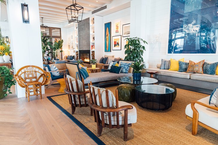 The eye-appealing lobby showcases a residential interior with a tasteful blend of blue and yellow decor.jpg